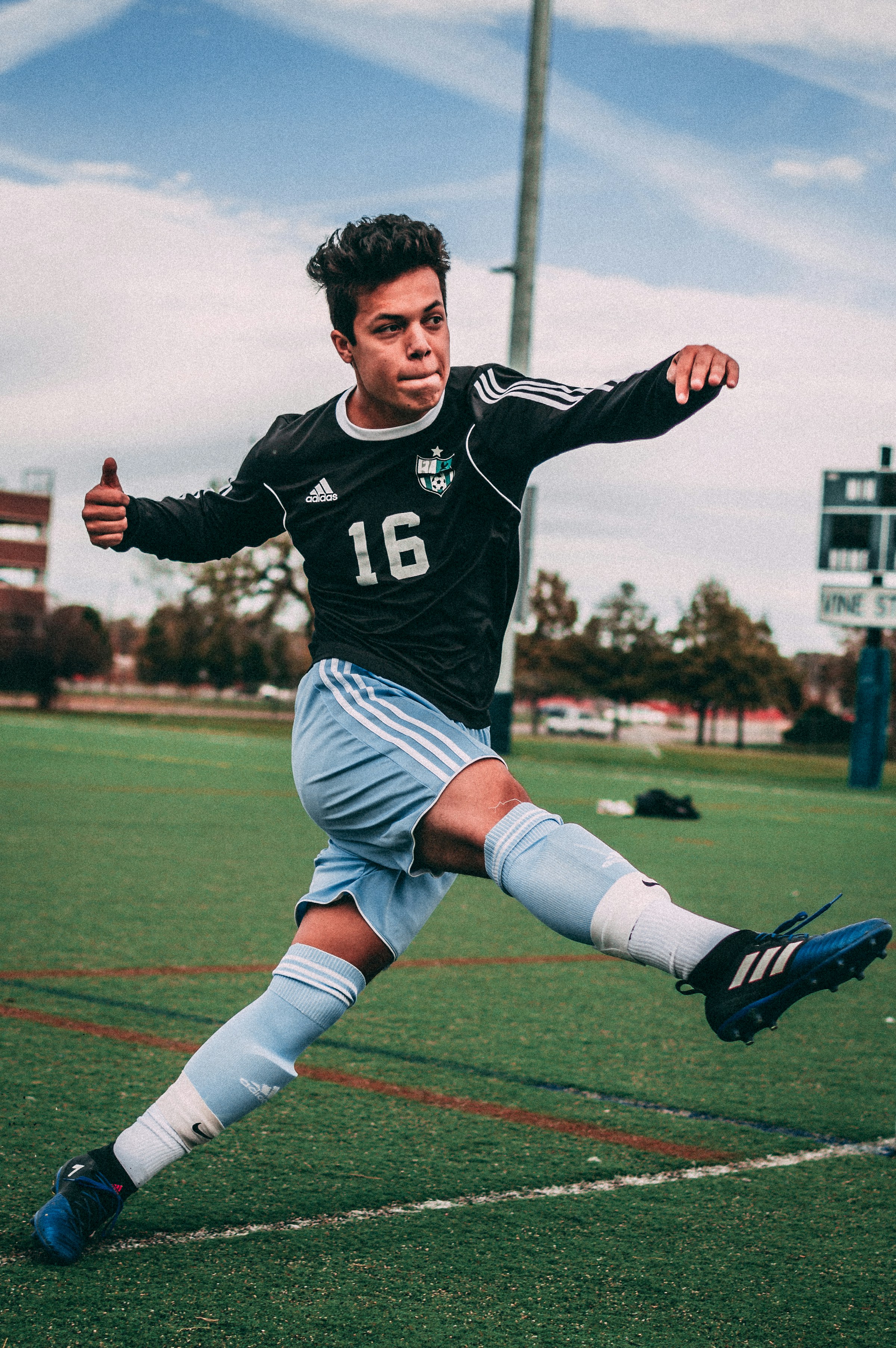 Teen playing soccer | Source: Unsplash