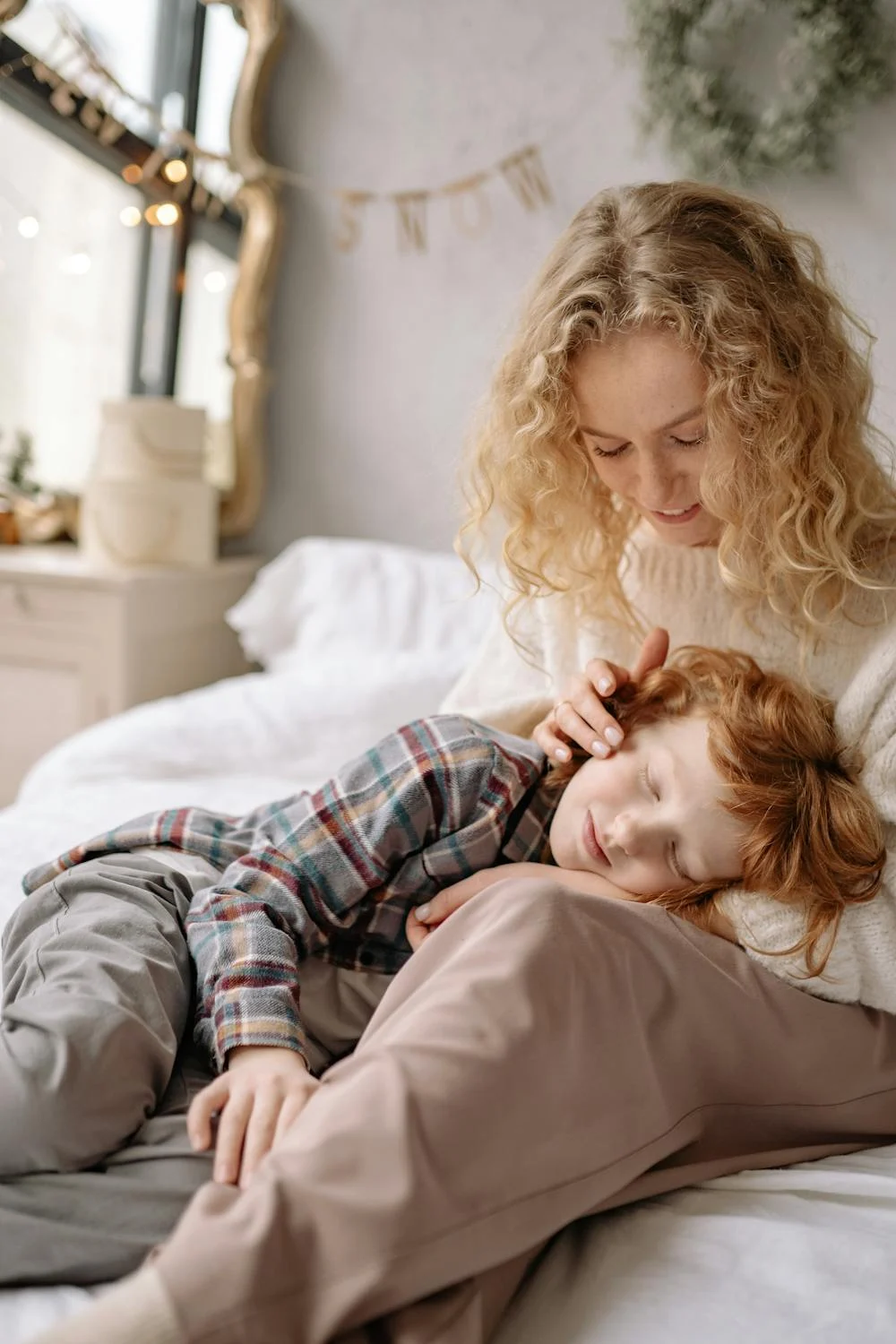 A happy boy and his mother | Source: Pexels