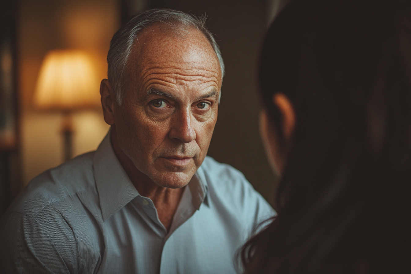 Mean senior man talking to his daughter | Source: Midjourney