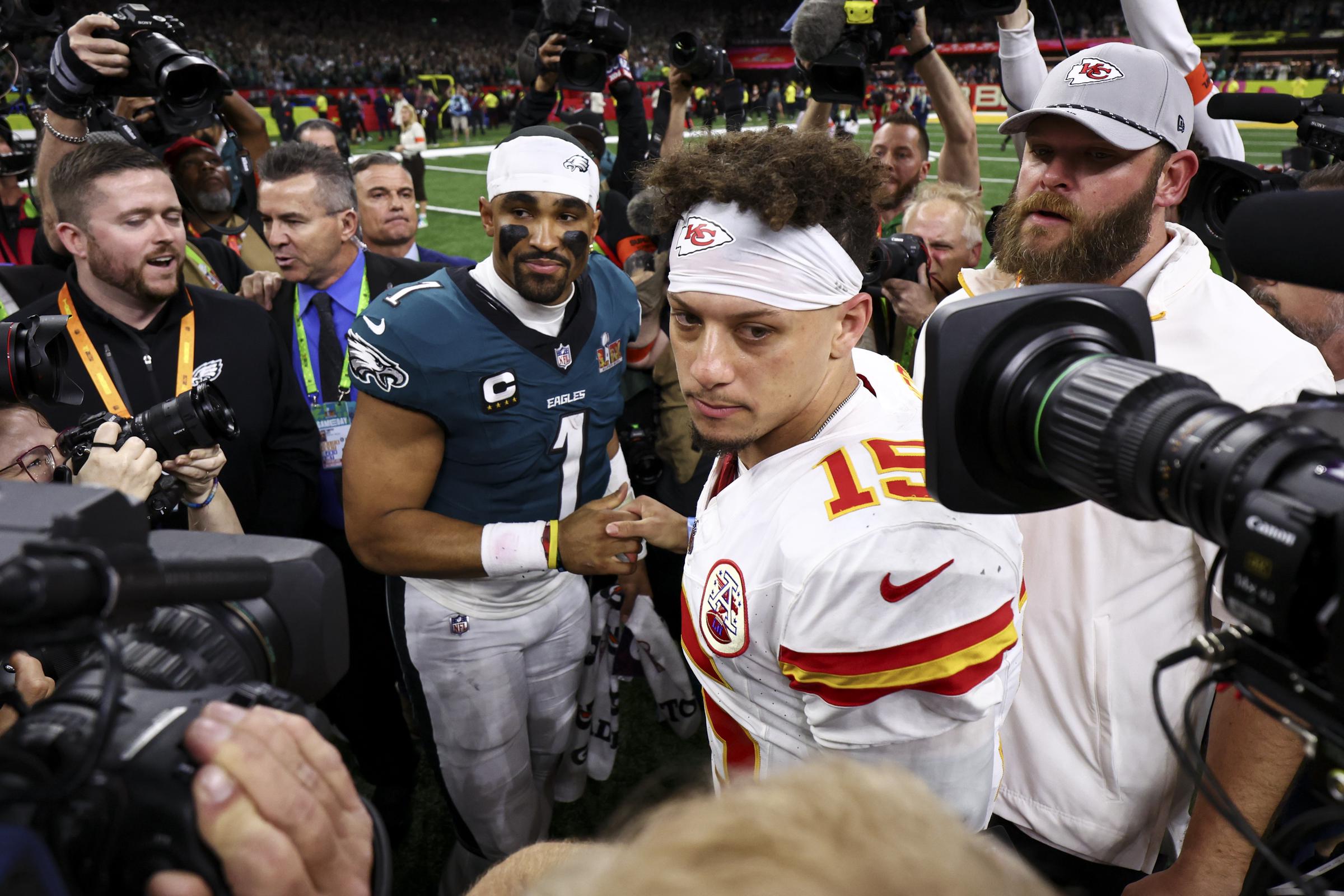 Jalen Hurts of the Philadelphia Eagles and Patrick Mahomes shaking hands after the Eagles defeated the Chiefs 40-22 in Super Bowl LIX on February 9, 2025, in New Orleans, Louisiana. | Source: Getty Images