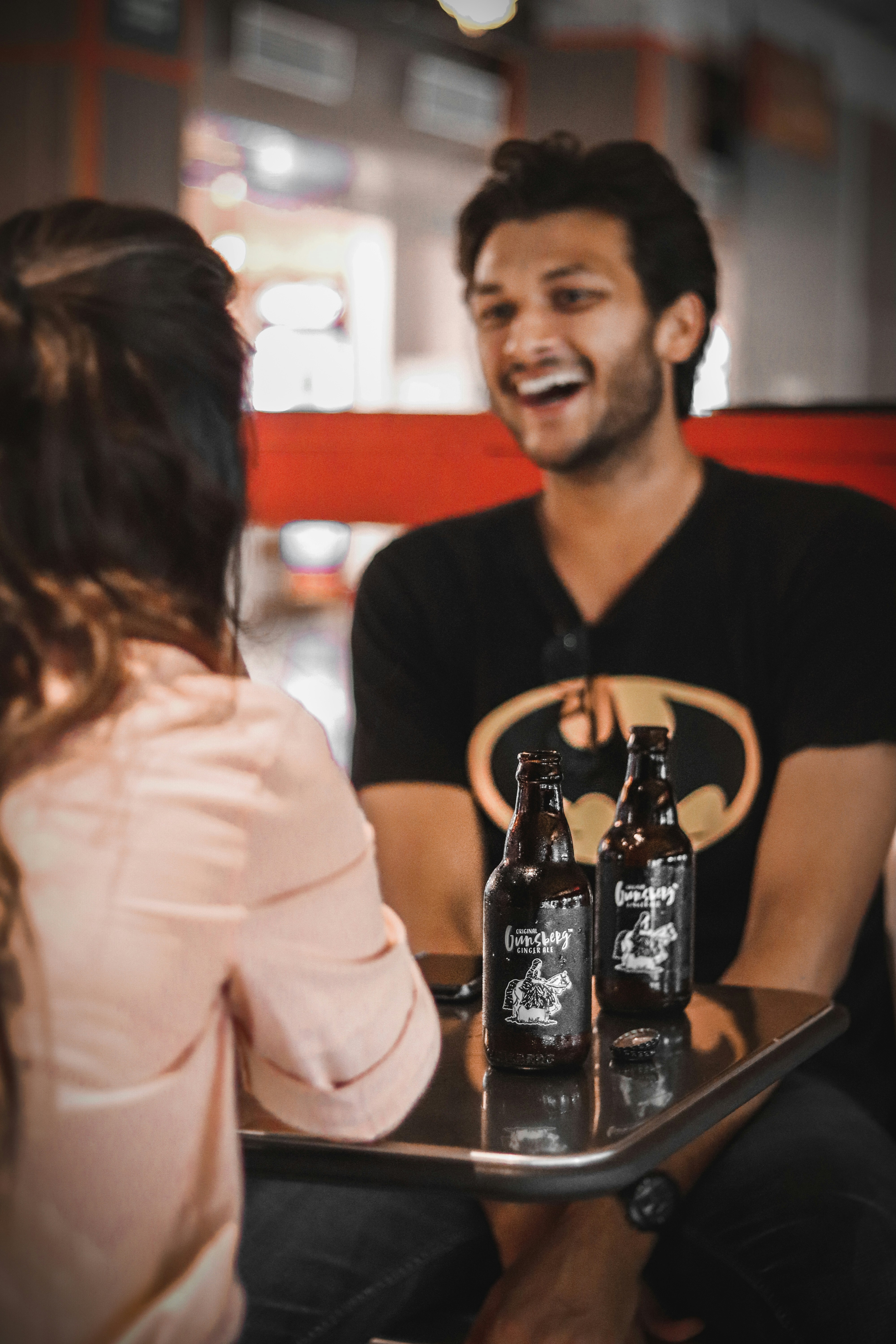 A couple laughing at a joke | Source: Unsplash