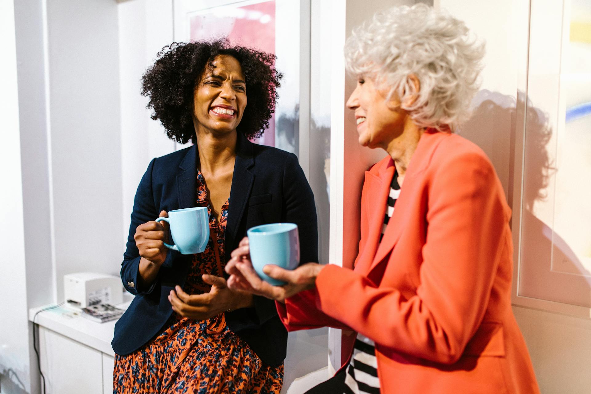 Two older woman having coffee together | Source: Pexels