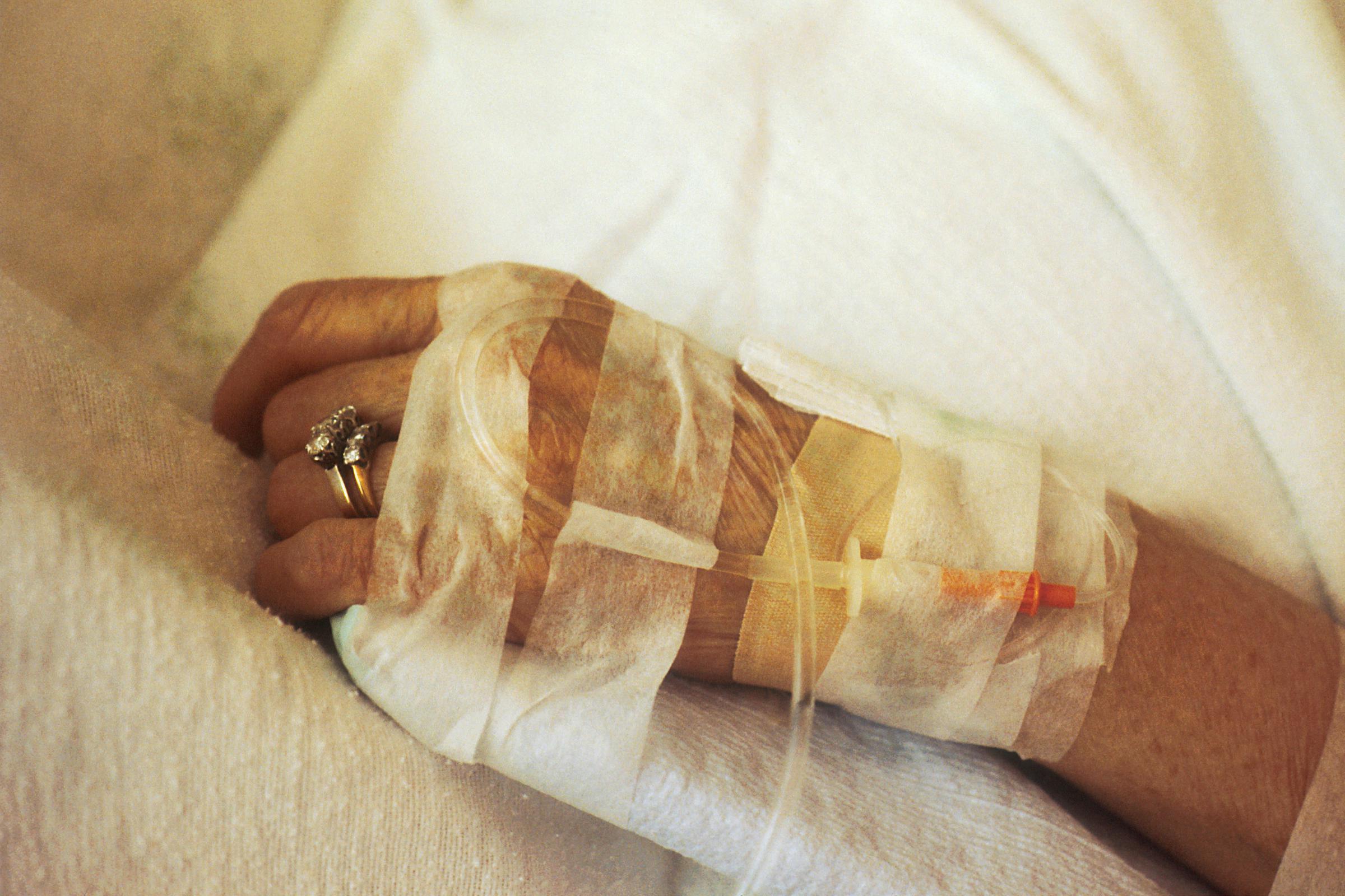 A woman with an IV in her arm | Source: Unsplash