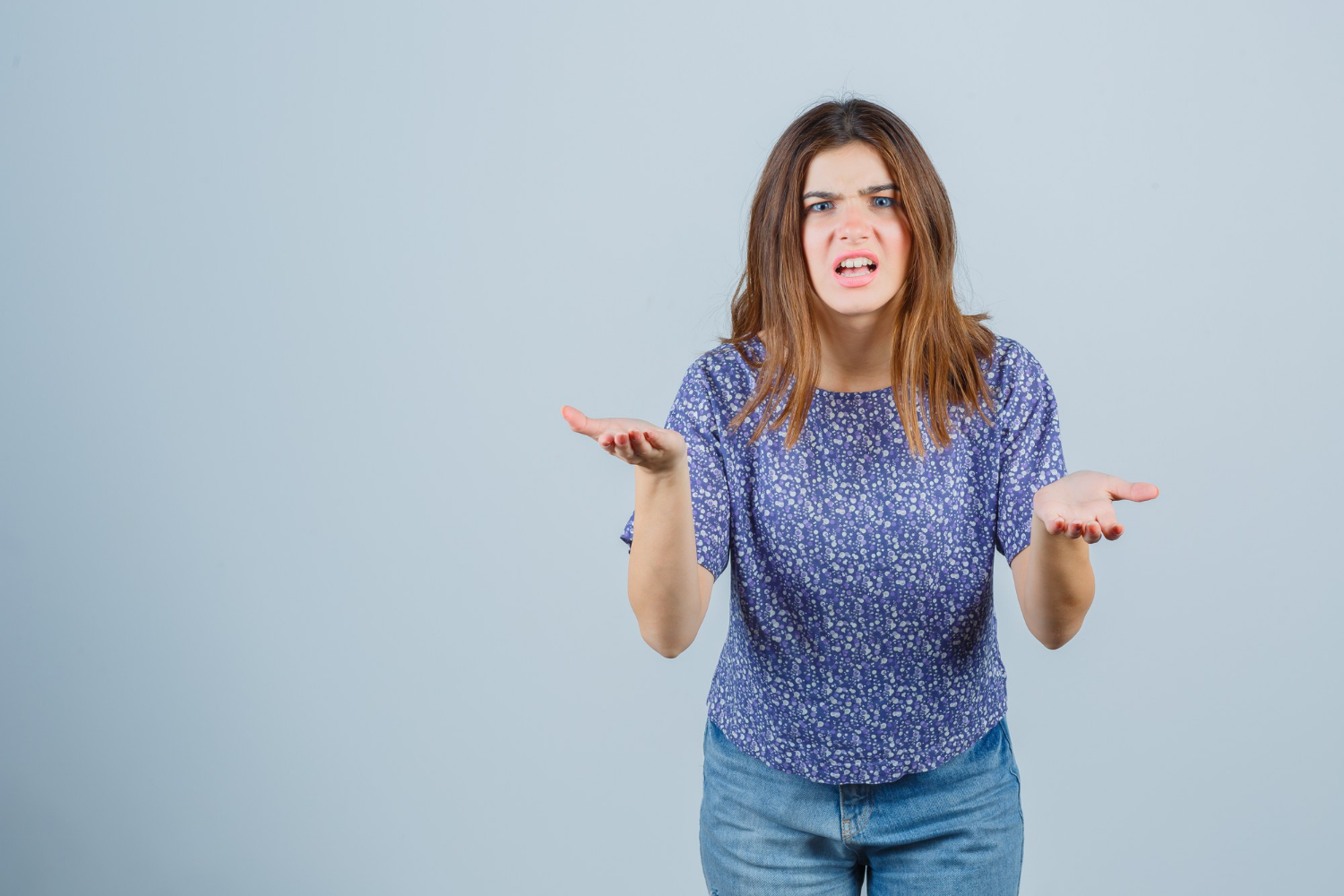 A frustrated young woman | Source: Freepik