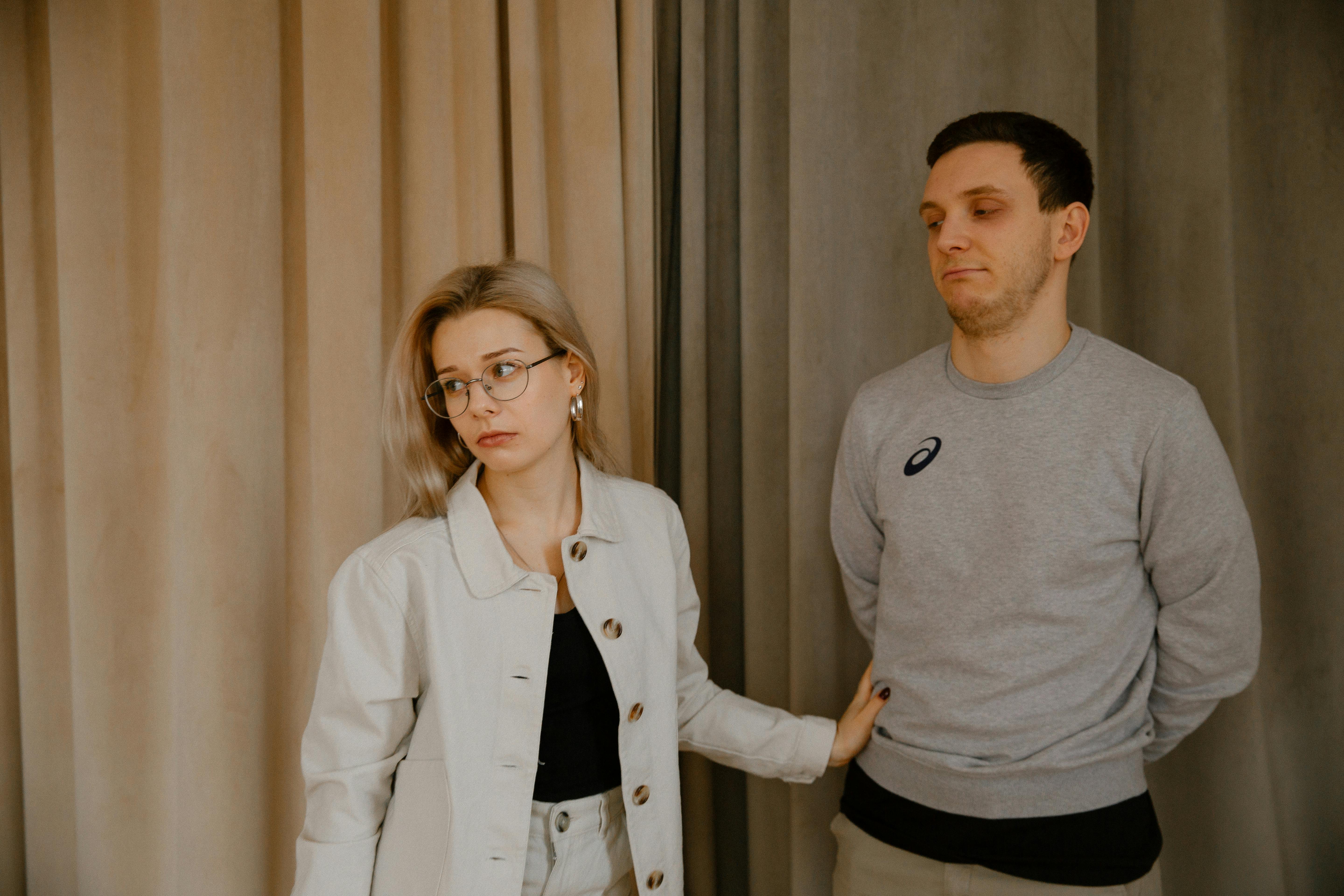 Disappointed woman looking away after having an argument with her husband | Source: Pexels