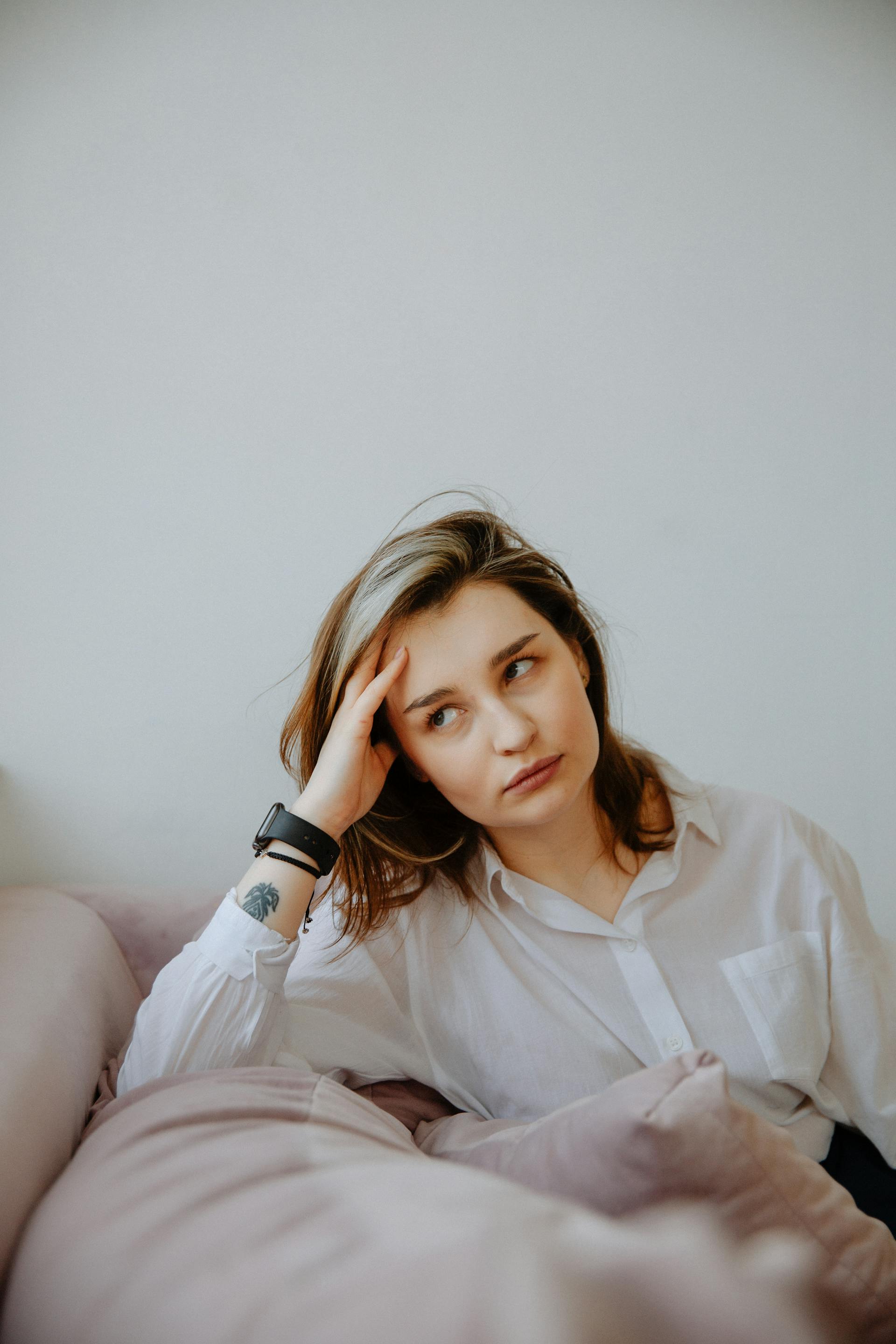 My Stepfather Told My Mom She Didn't Need Pretty Clothes Anymore – It Was His Biggest Mistake 13 An unimpressed woman eying someone off-camera | Source: Pexels