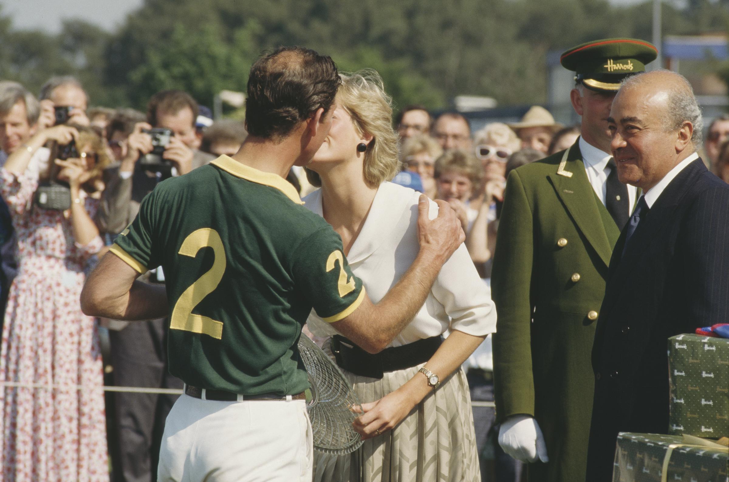 Diana, Princess of Wales with Prince Charles and Mohamed Al-Fayed during the Harrods Polo Cup at Smith's Lawn in Windsor, UK, in July 1987. | Source: Getty Images