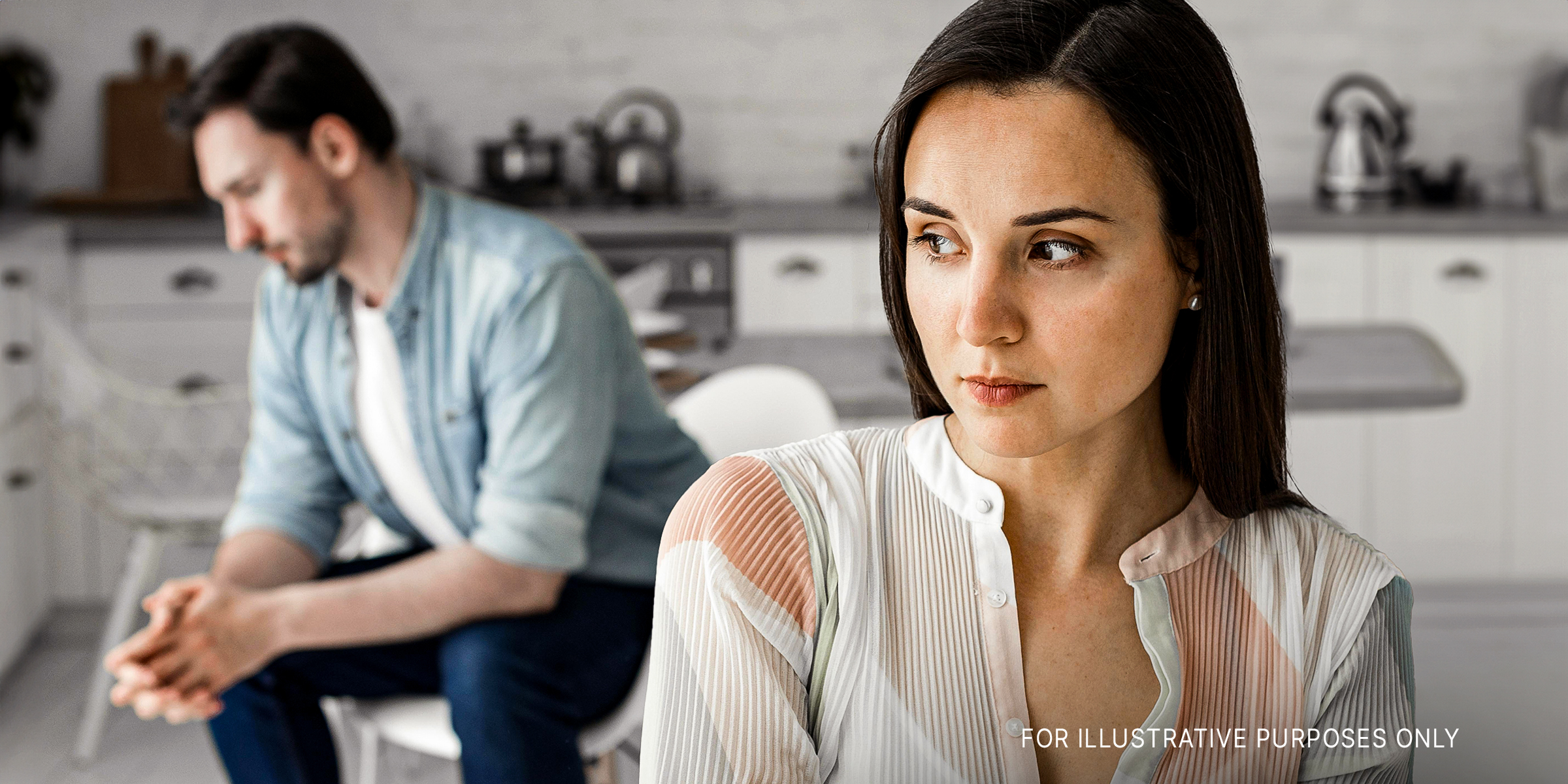 A couple in the kitchen | Source: Freepik