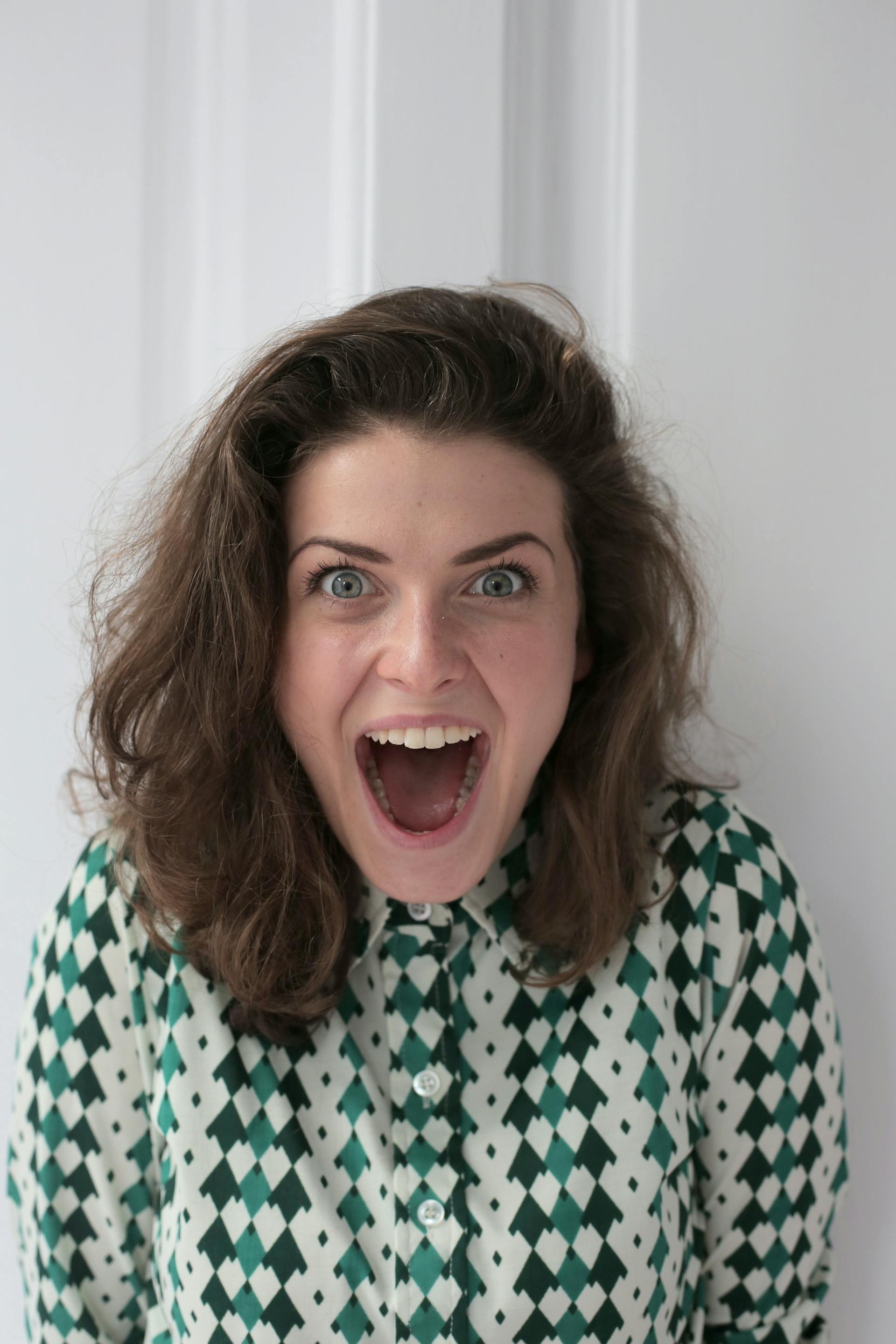 A pleasantly surprised woman | Source: Pexels