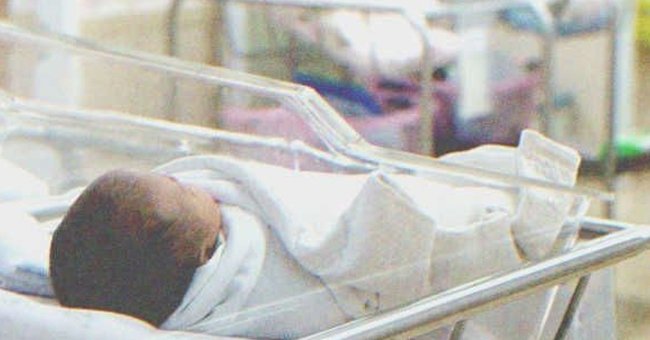 A baby sleeping on a crib | Source: Shutterstock