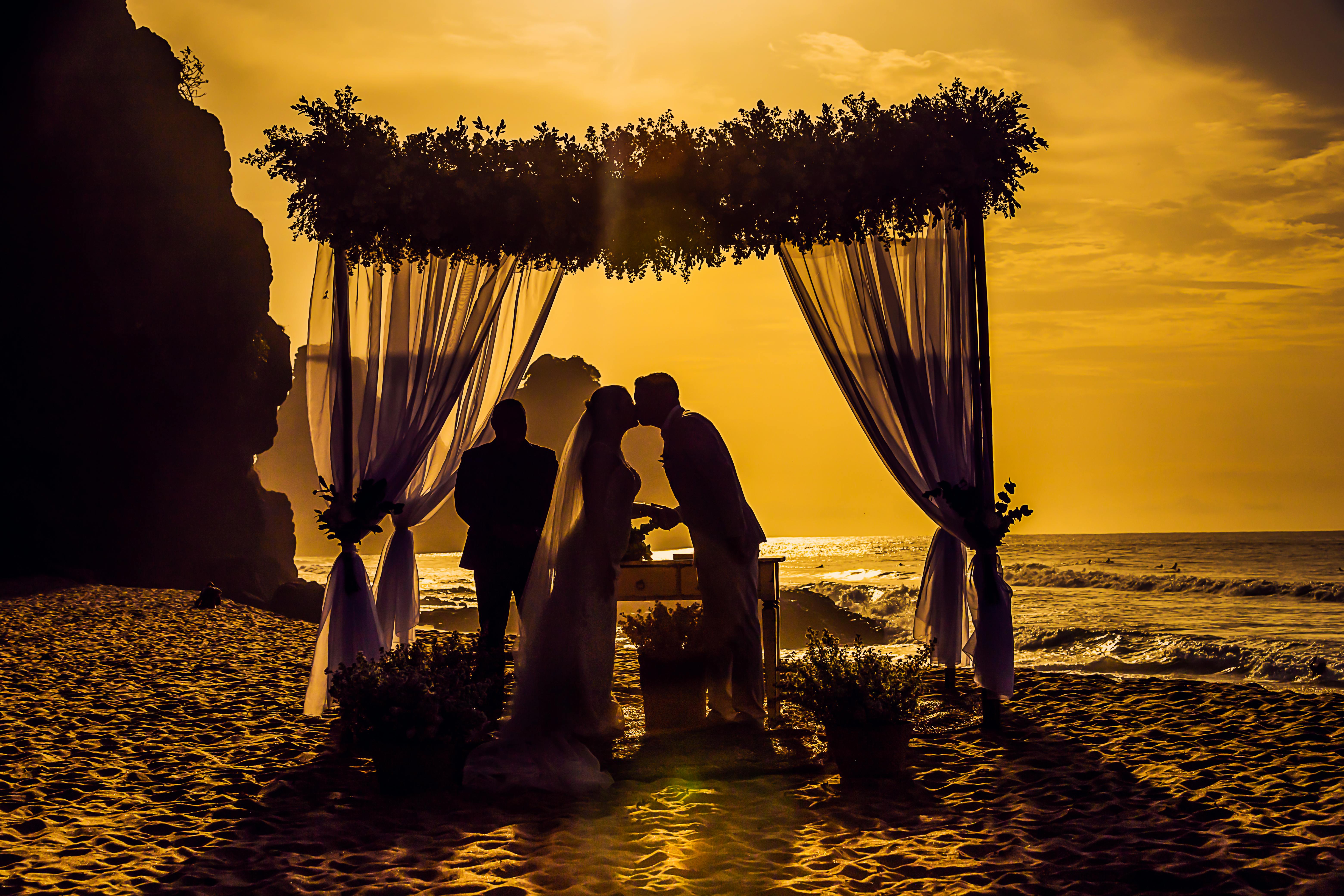 A couple getting married on a beach | Source: Pexels