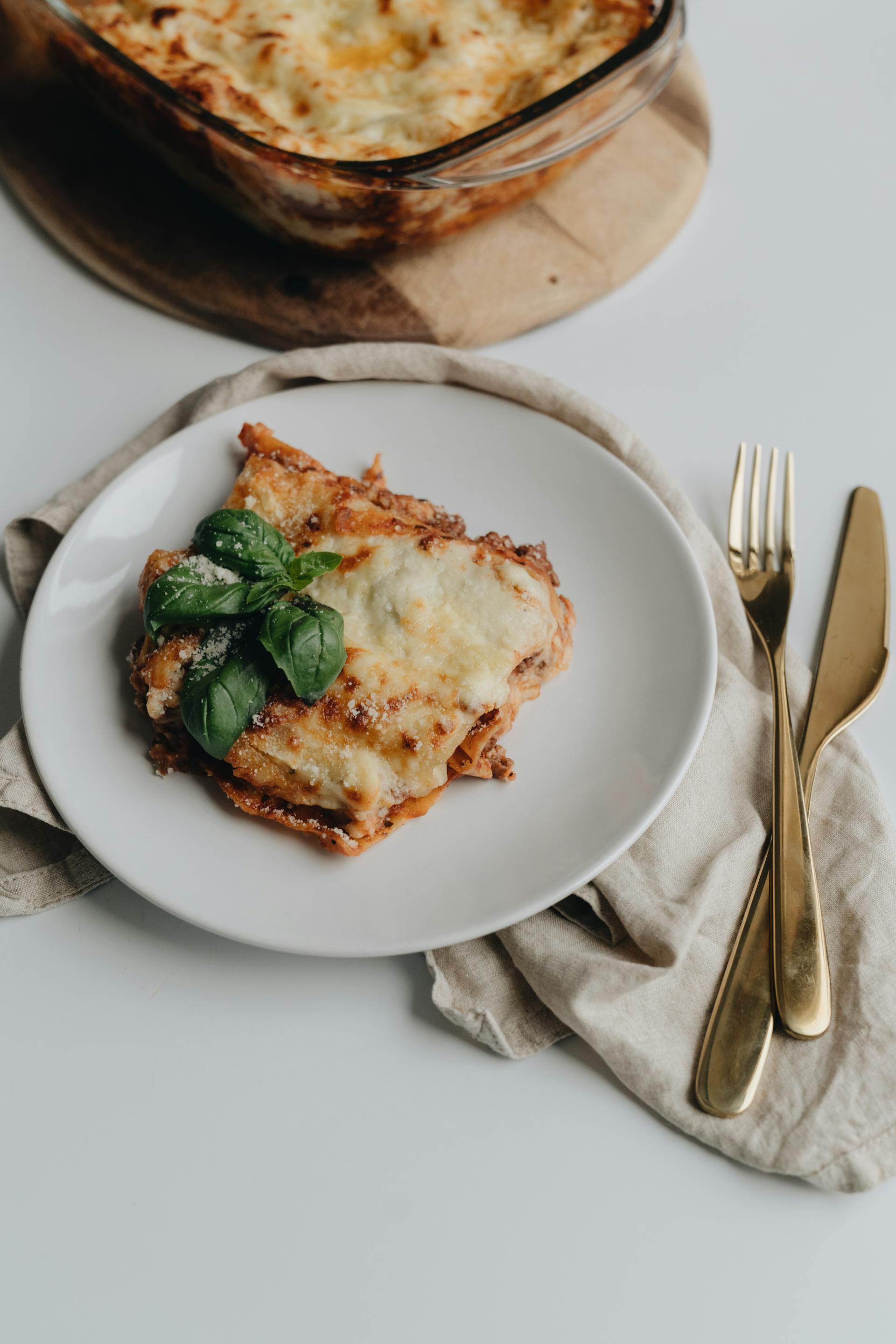 A plate of lasagna on a table | Source: Pexels