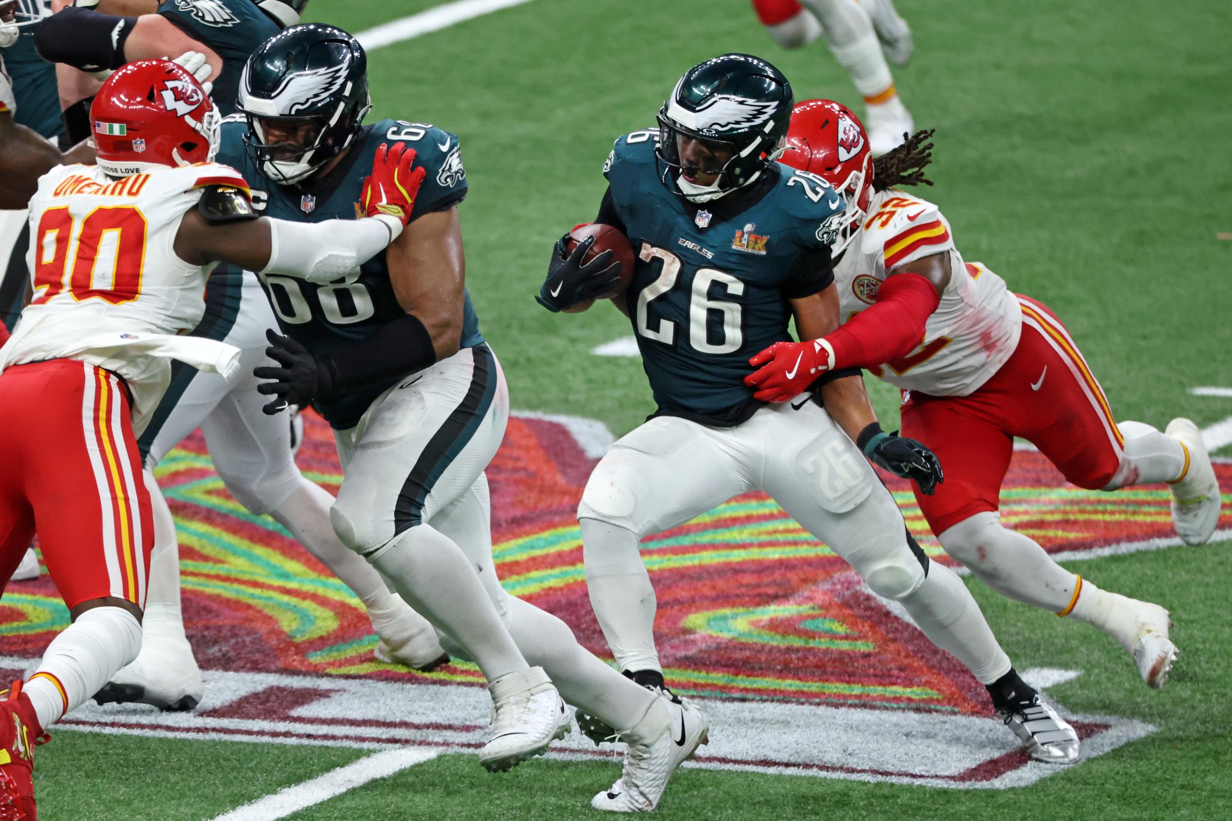 Nick Bolton tackling Saquon Barkley in the fourth quarter during Super Bowl LIX on February 9, 2025. | Source: Getty Images