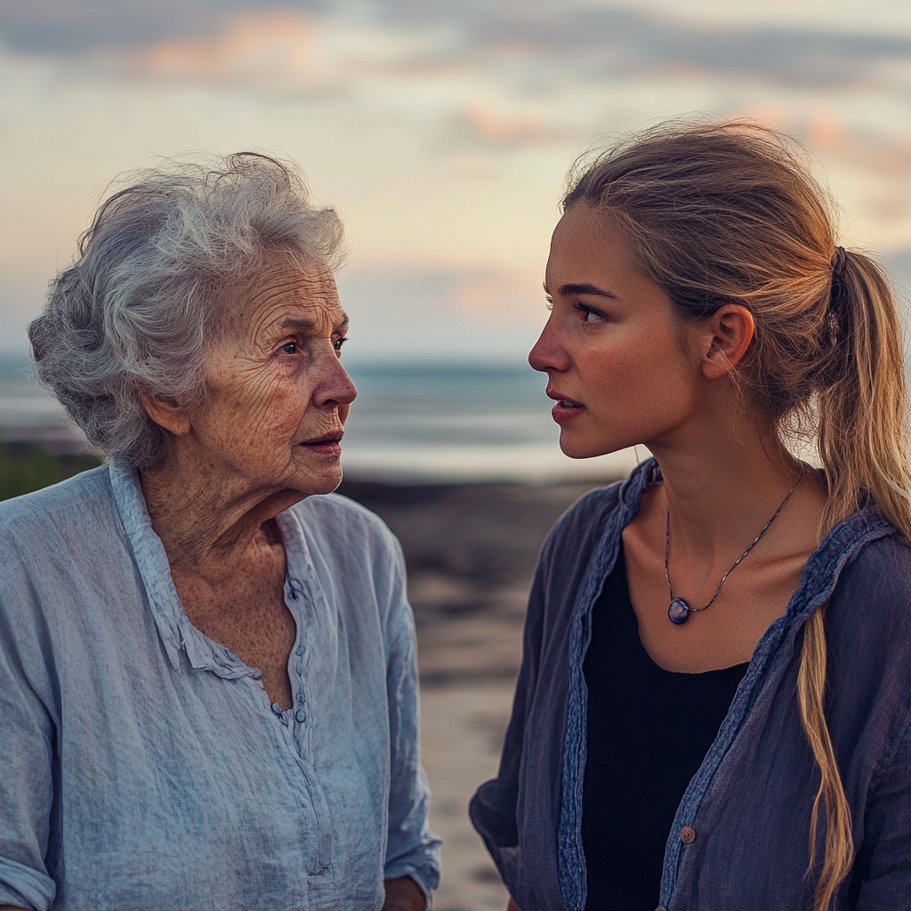 Two women talking on a beach | Source: Midjourney