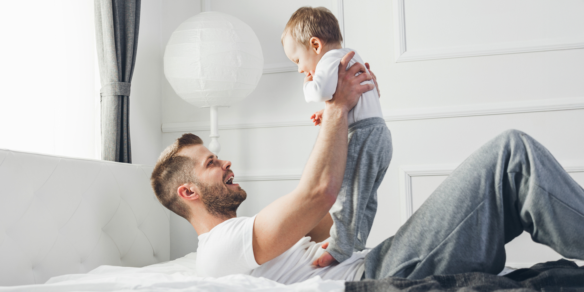 A father playing with his son | Source: Shutterstock
