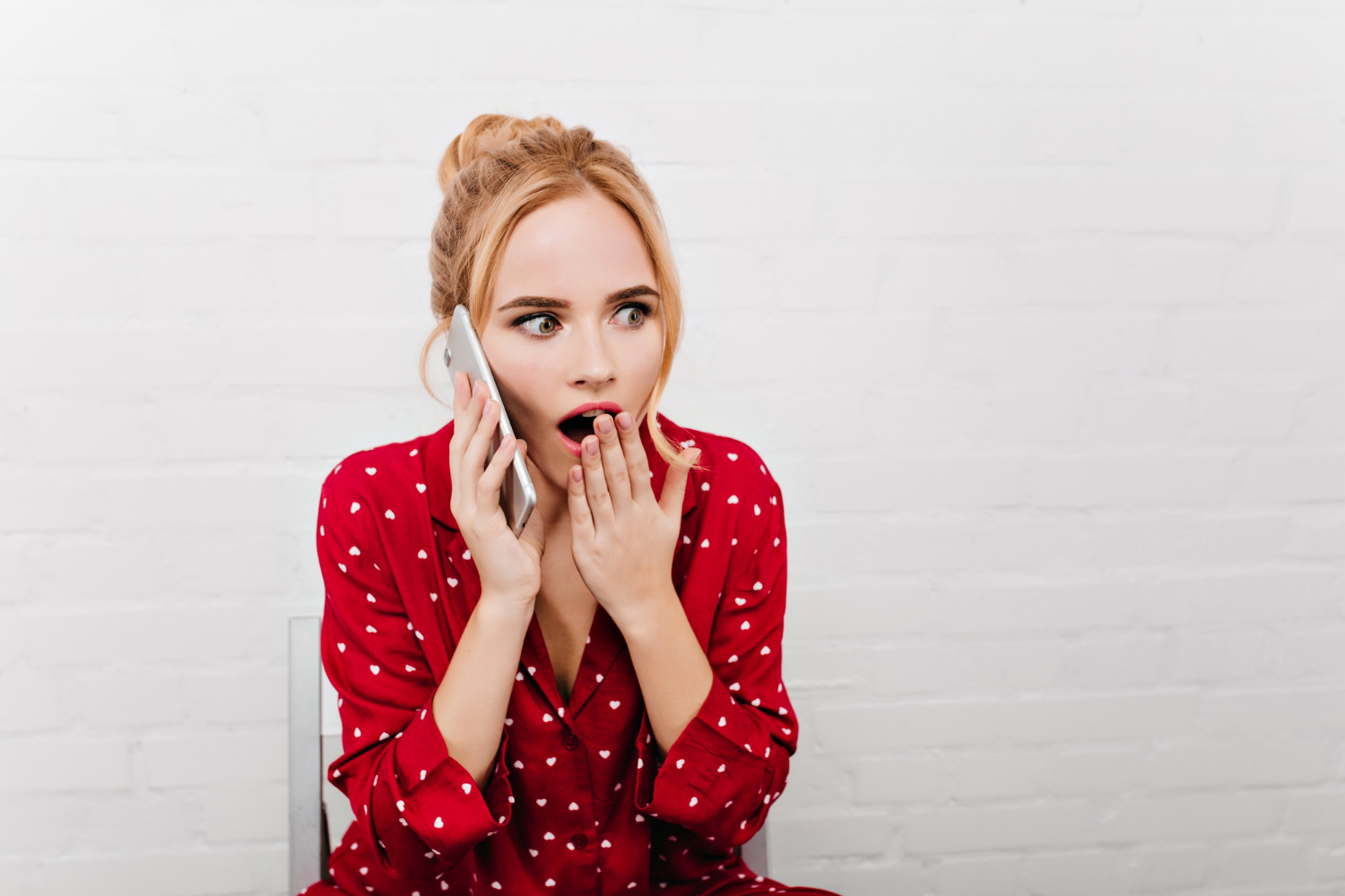 My Sister Excluded My Son from Her Wedding After He Made Her Dress, but Still Expected to Wear It – We Gave Her One Condition to Keep It 17 A startled woman talking on the phone | Source: Freepik