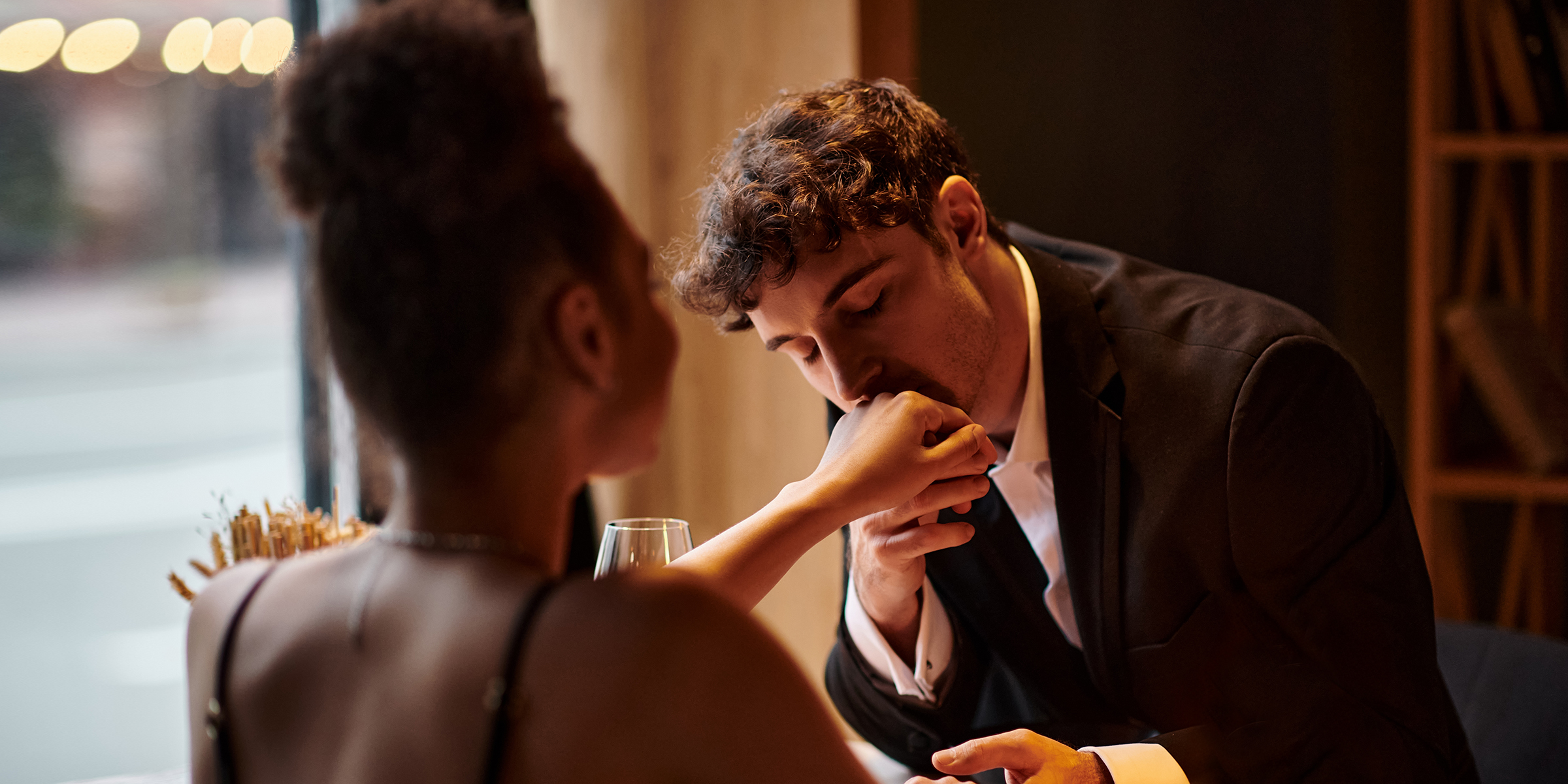 A couple having a romantic dinner | Source: Shutterstock