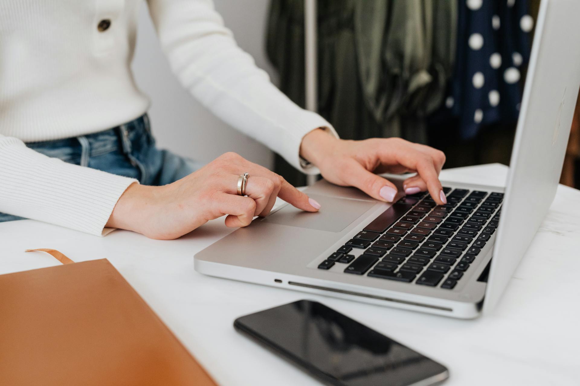 A woman using a laptop | Source: Pexels