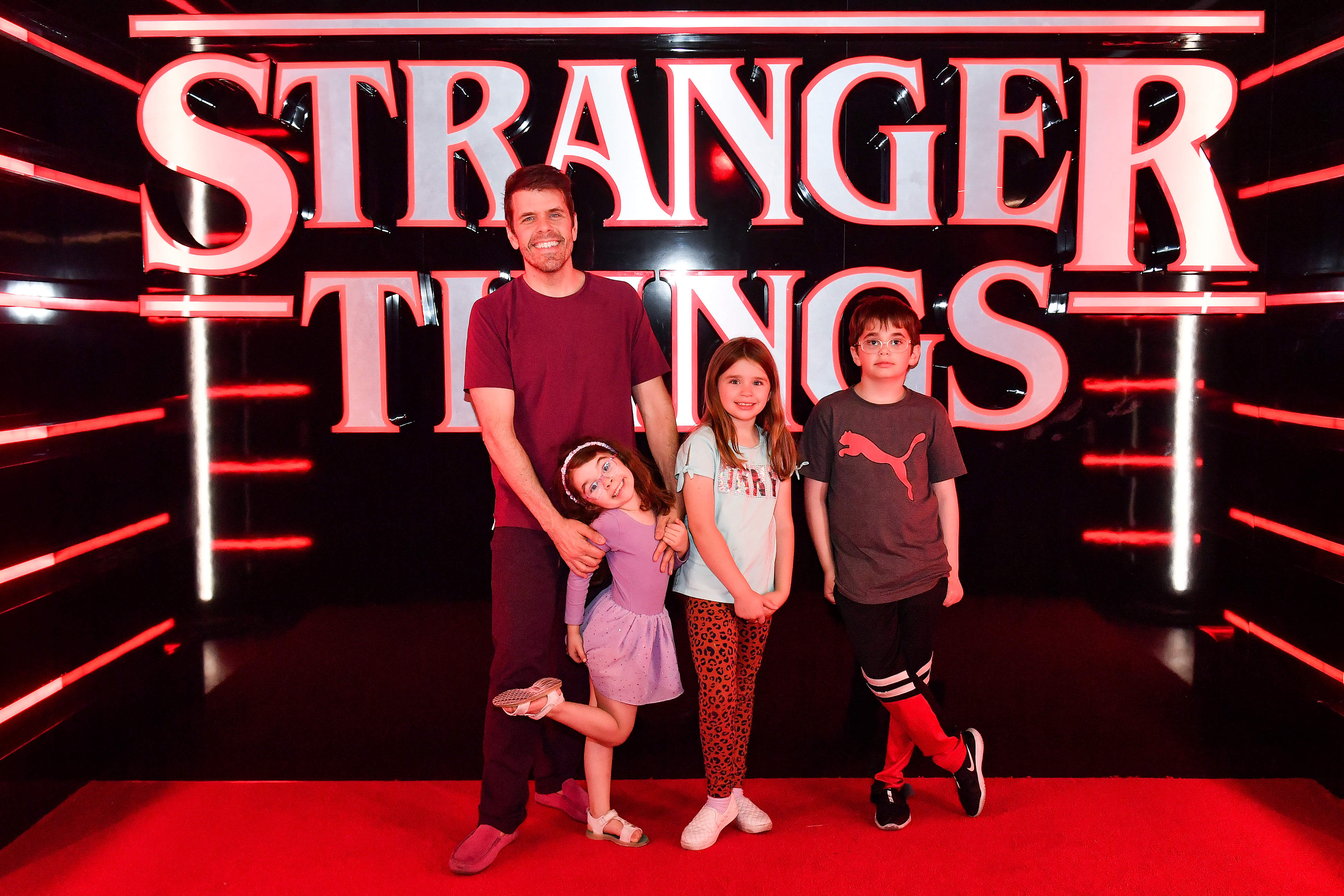 Perez Hilton and his children attend the grand opening event for Netflix's Stranger Things: The Official Store at the Showcase Mall on June 8, 2023 in Las Vegas, Nevada. | Source: Getty Images