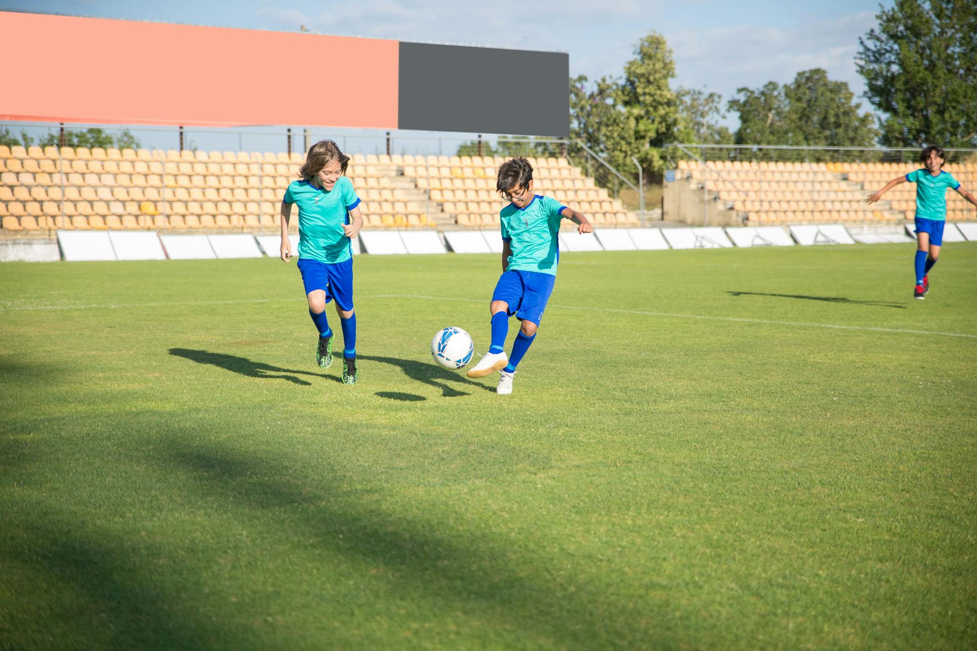 Kids playing soccer | Source: Pexels