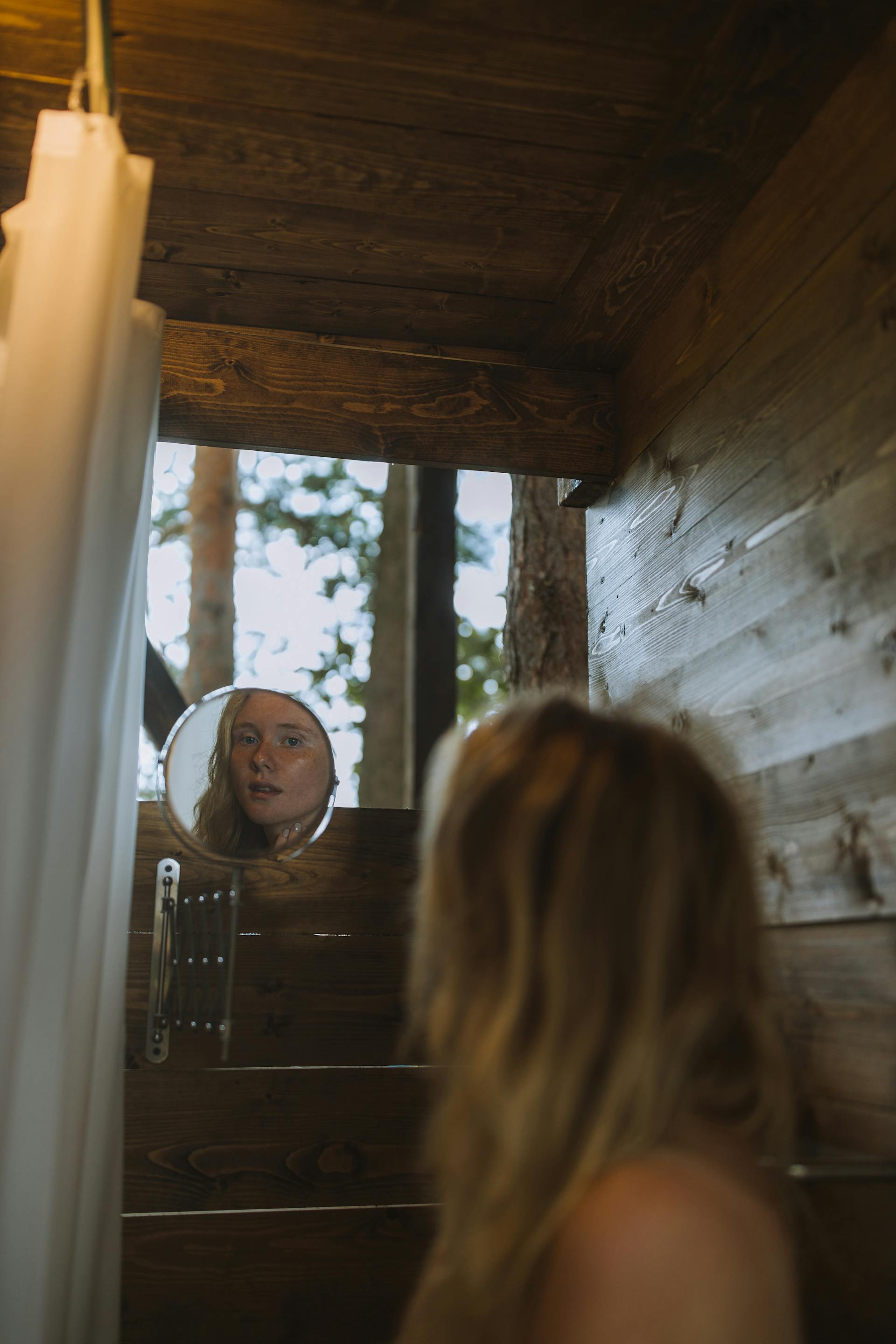 A woman in an outdoor bathing area | Source: Pexels