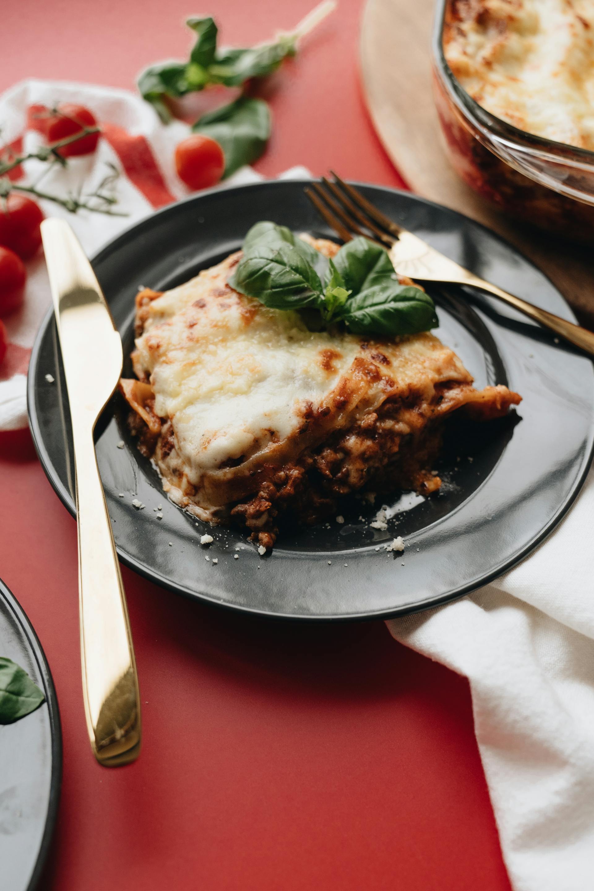 A portion of lasagna on a plate | Source: Pexels