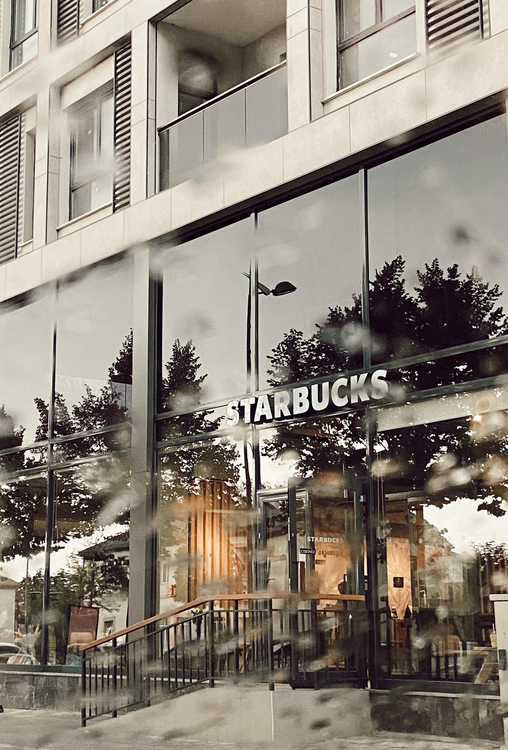 A café with trees reflected on the windows | Source: Pexels