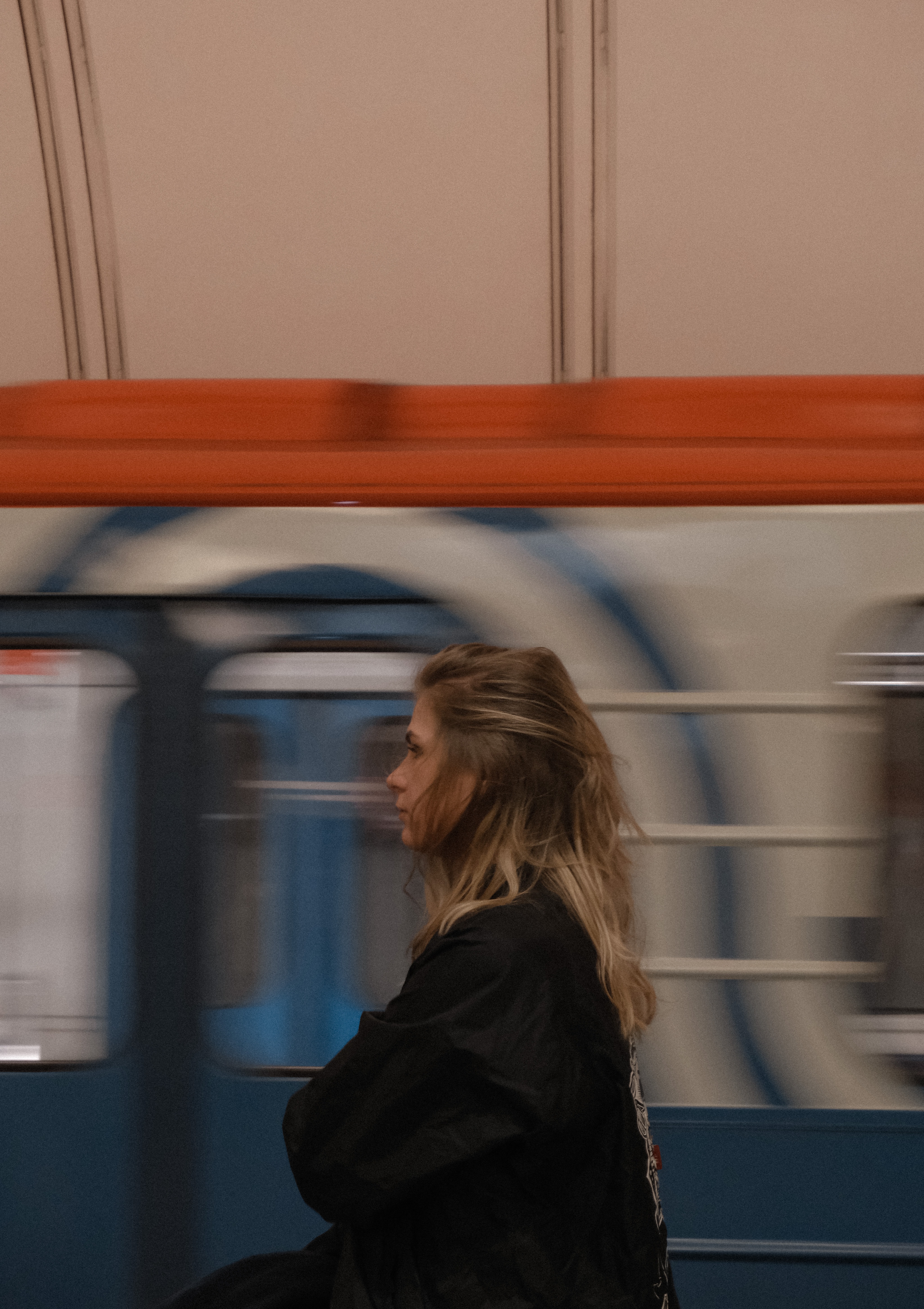 A woman standing at a subway station | Source: Pexels