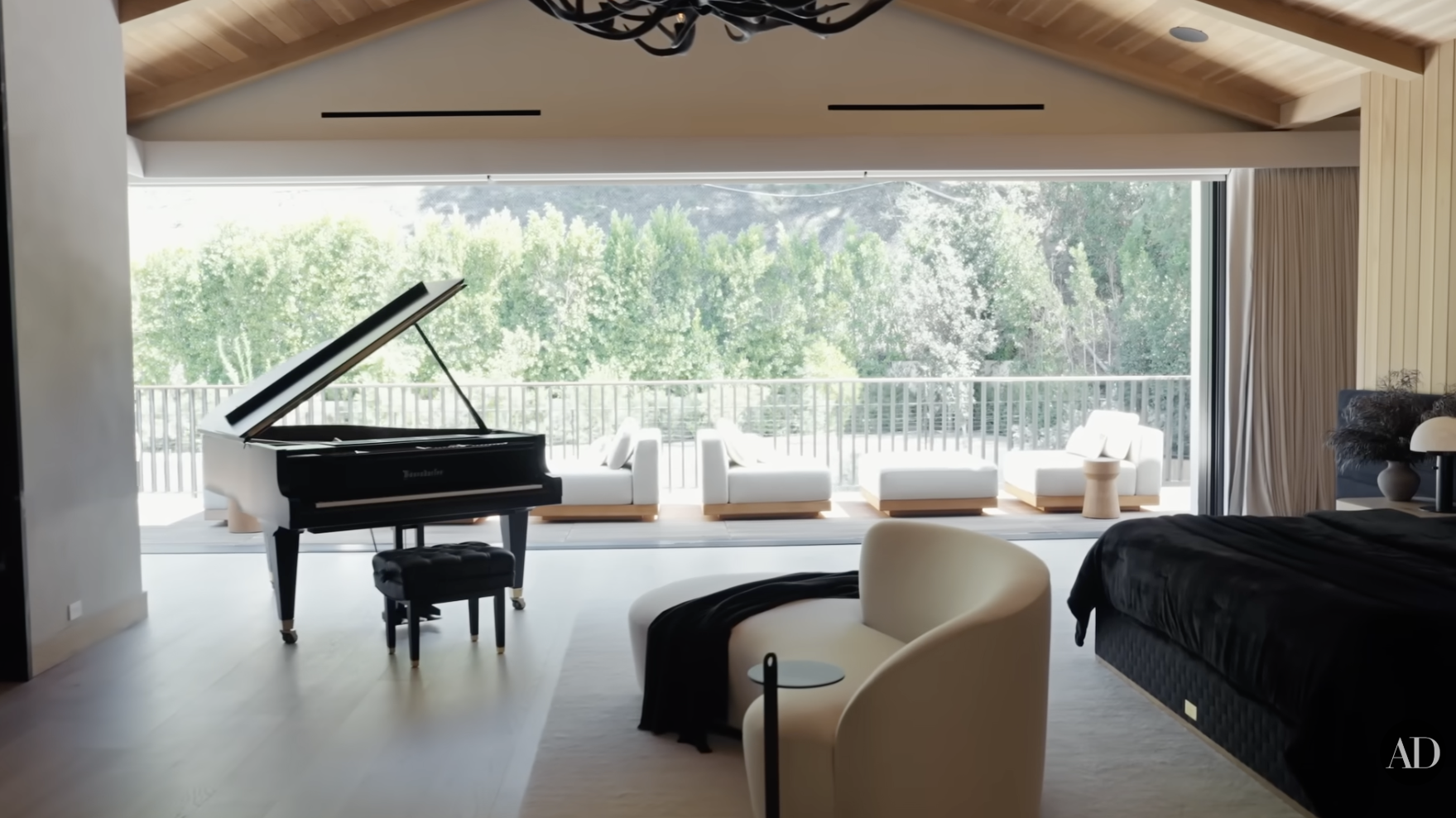 The view of Zedd's primary suite living room, posted by Architectural Digest on November 8, 2025. | Source: YouTube/Architectural Digest