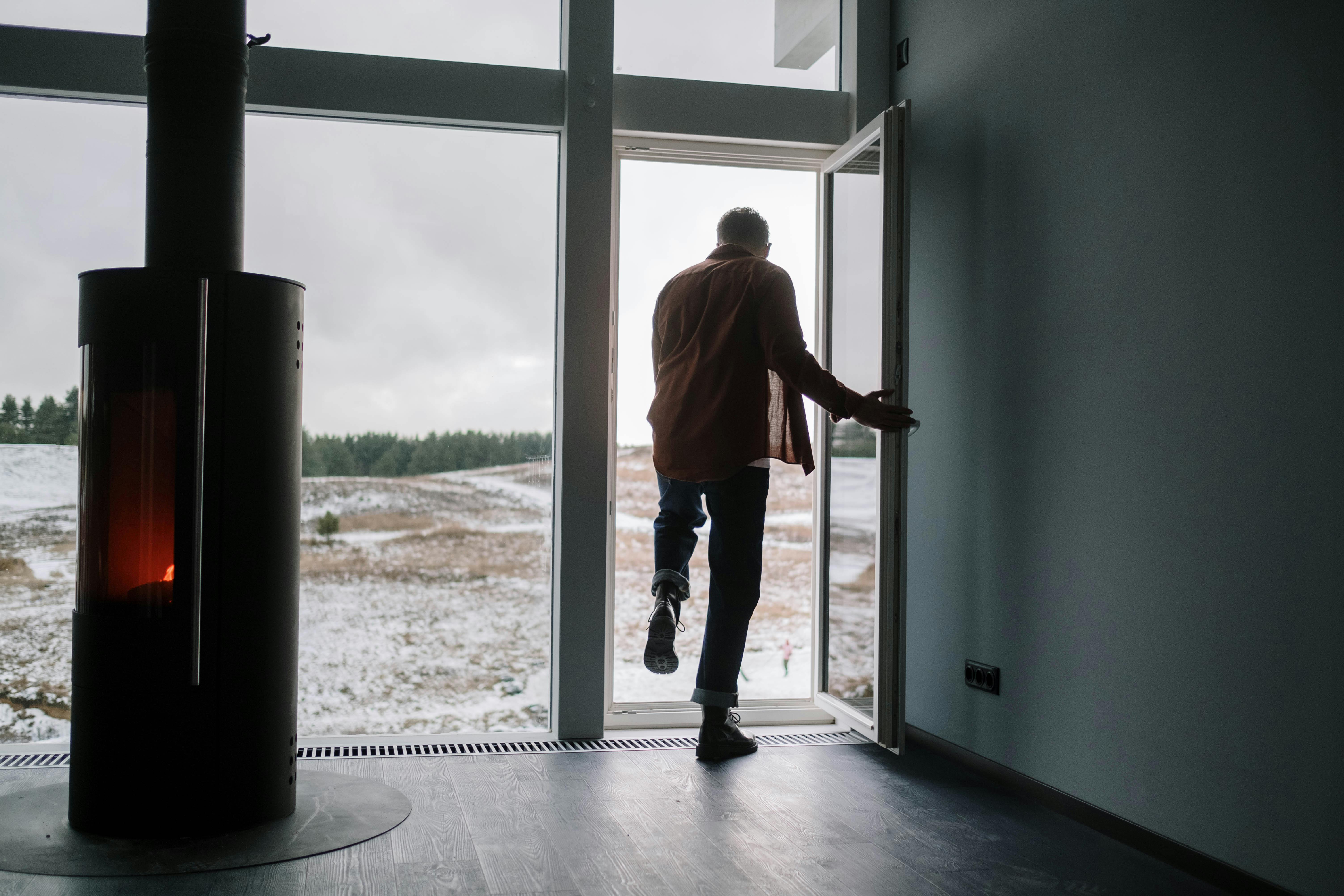 A man walking out of a house | Source: Pexels