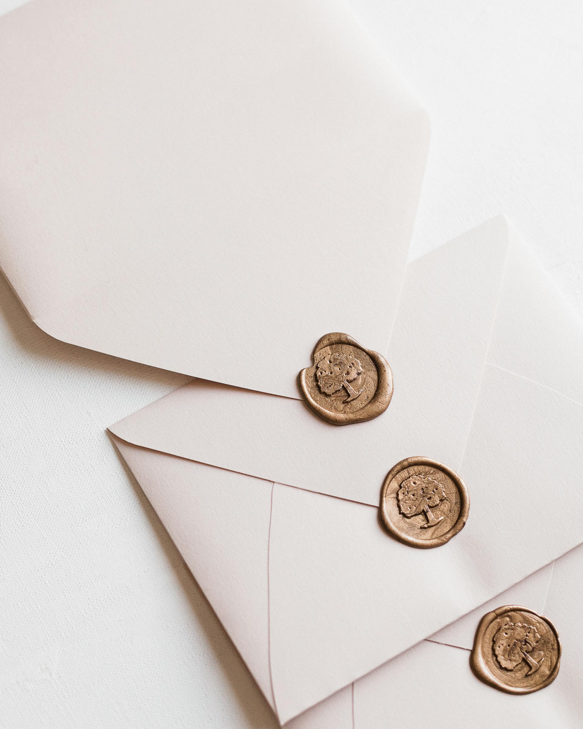 Envelopes sealed with gold wax | Source: Pexels