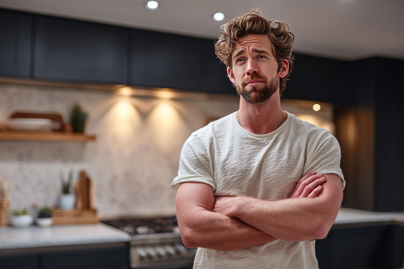 A man standing in a modern kitchen | Source: Midjourney