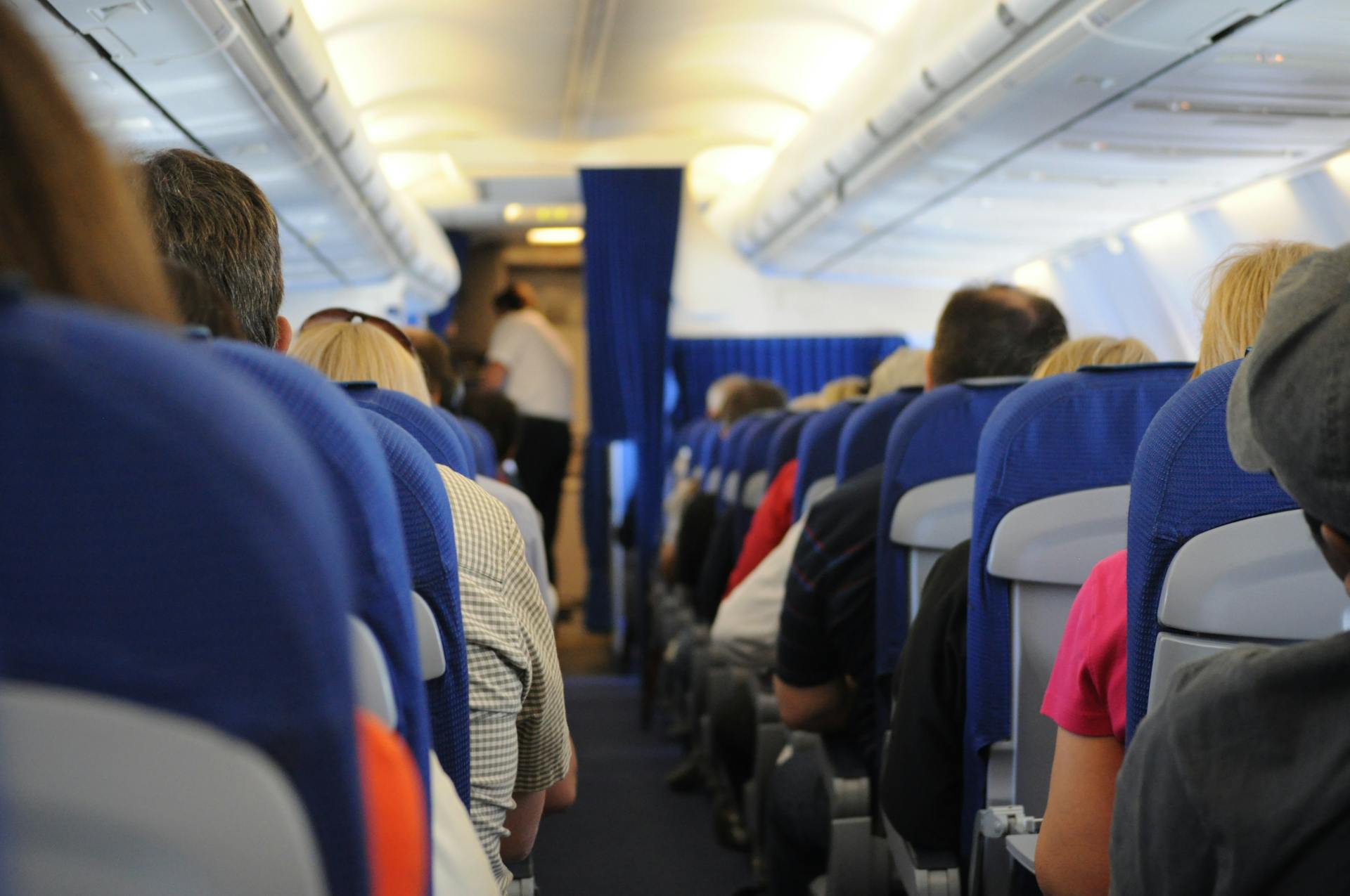 Passengers in an airplane | Source: Pexels