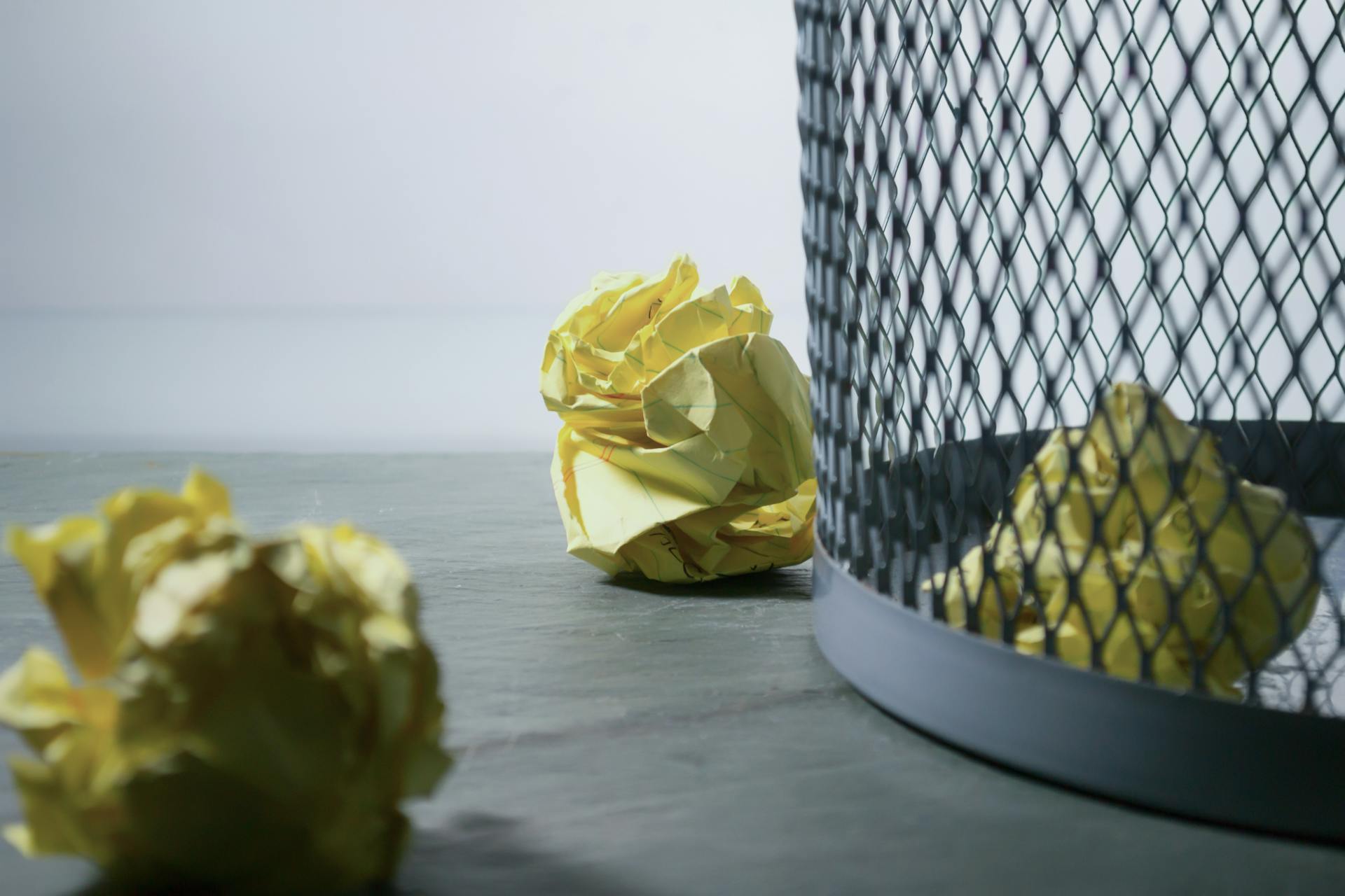 Crumpled paper near trash can | Source: Pexels