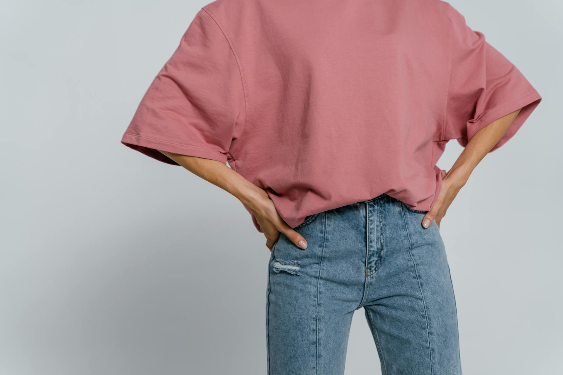 A woman in an oversized shirt | Source: Pexels