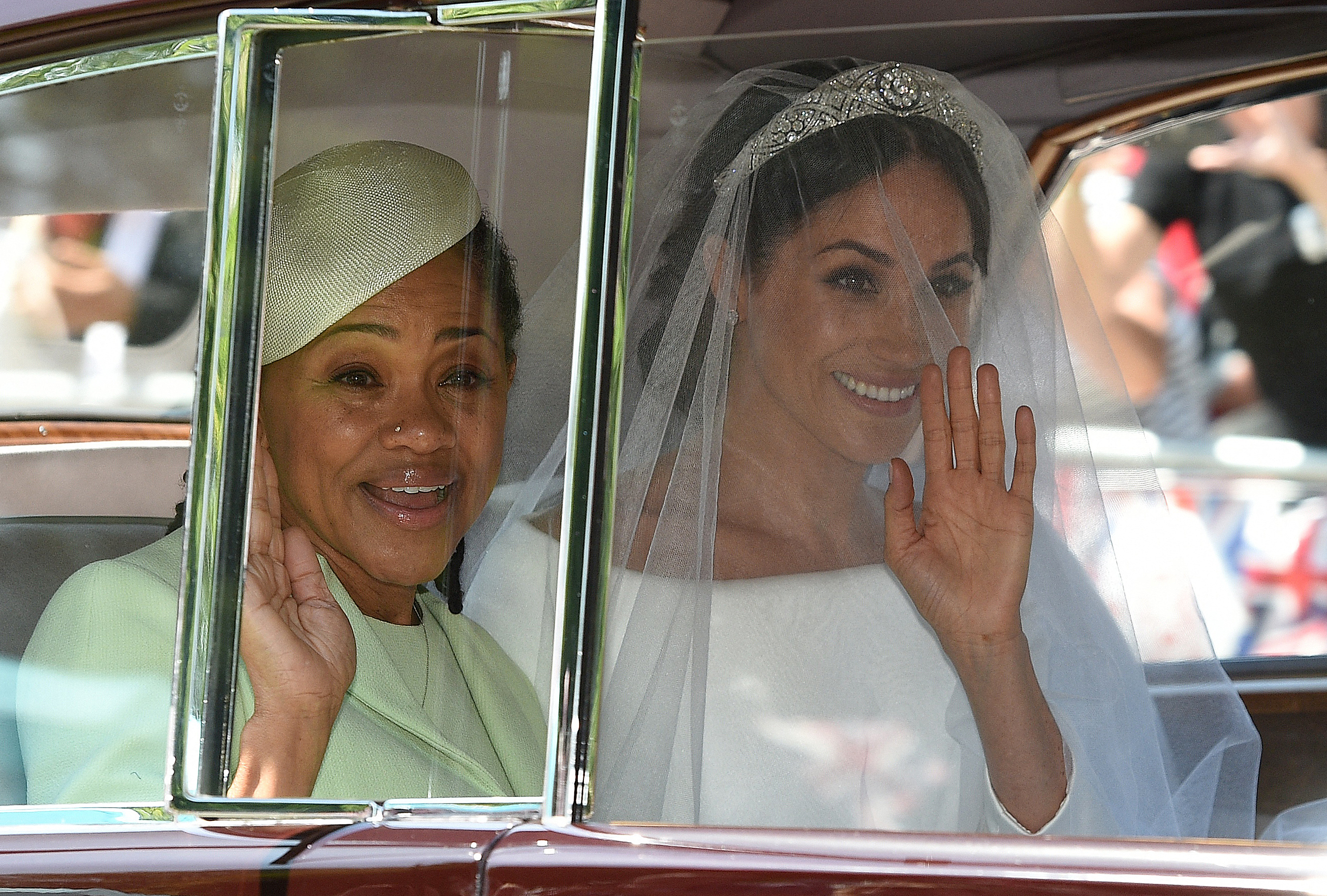 Meghan Markle (R) and her mother, Doria Ragland, arrive for her wedding ceremony to marry Britain's Prince Harry, Duke of Sussex, at St George's Chapel, Windsor Castle, in Windsor, on May 19, 2018.