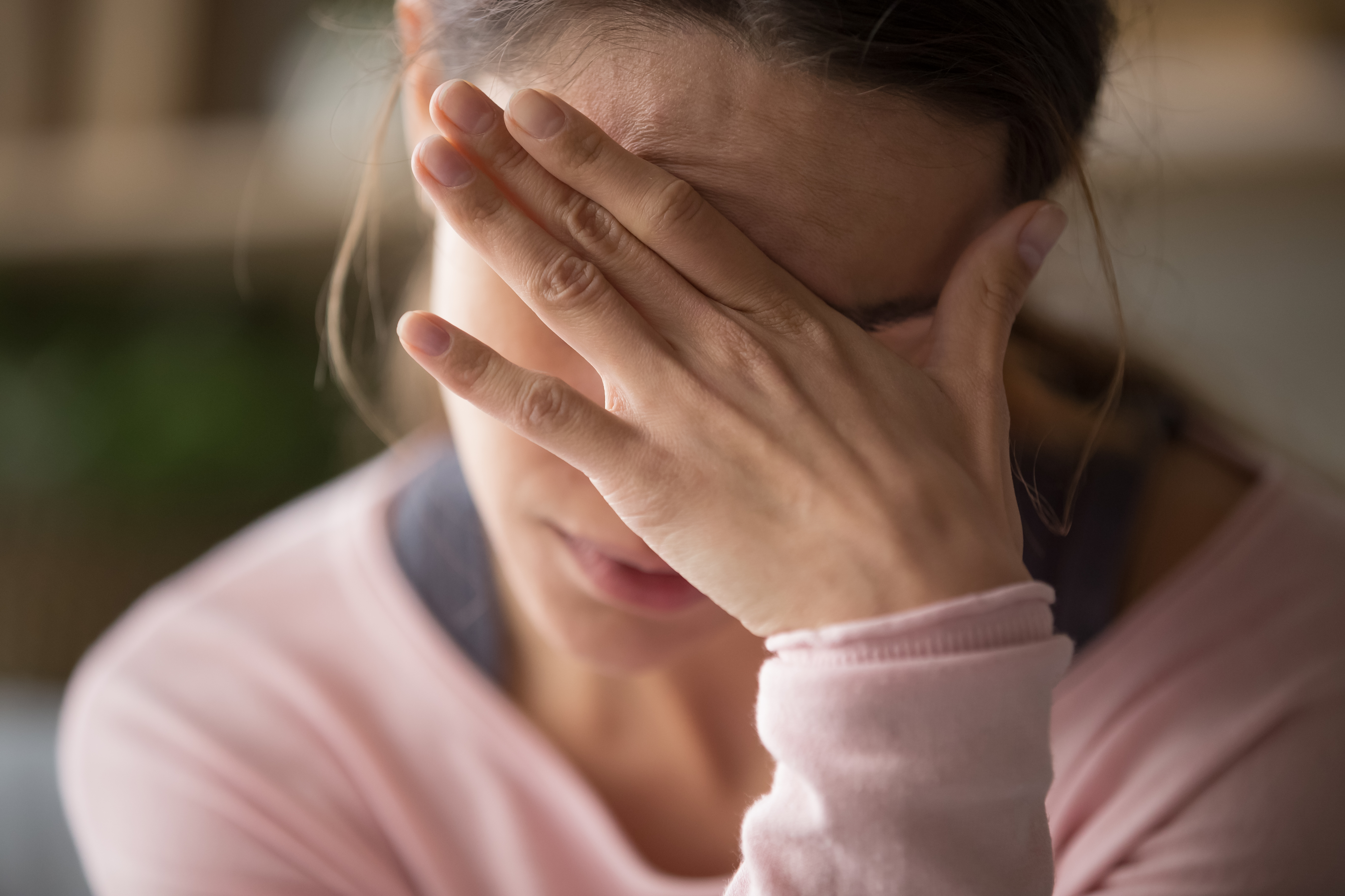 Sad tired young woman | Source: Shutterstock