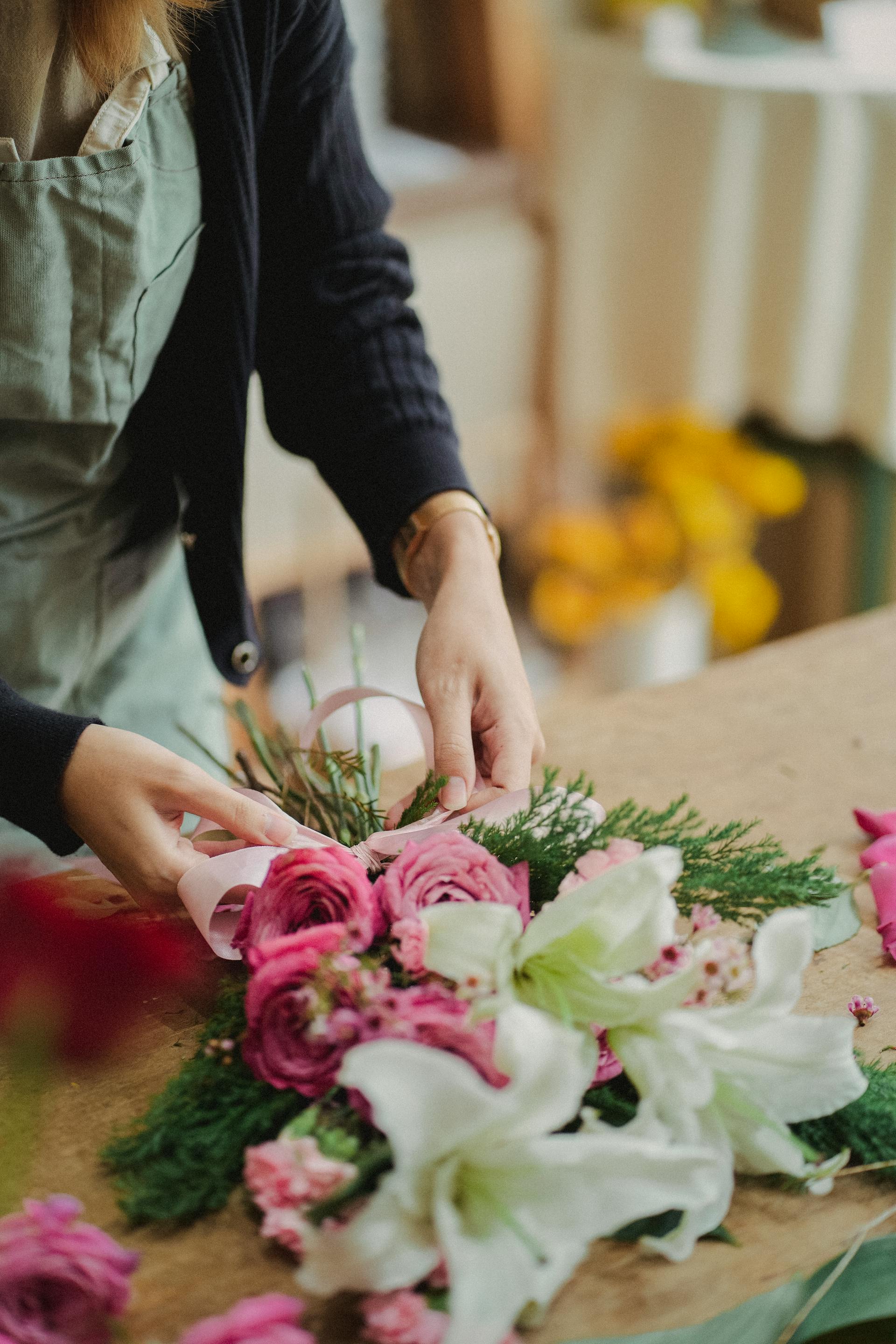 A florist making a bouquet | Source: Pexels
