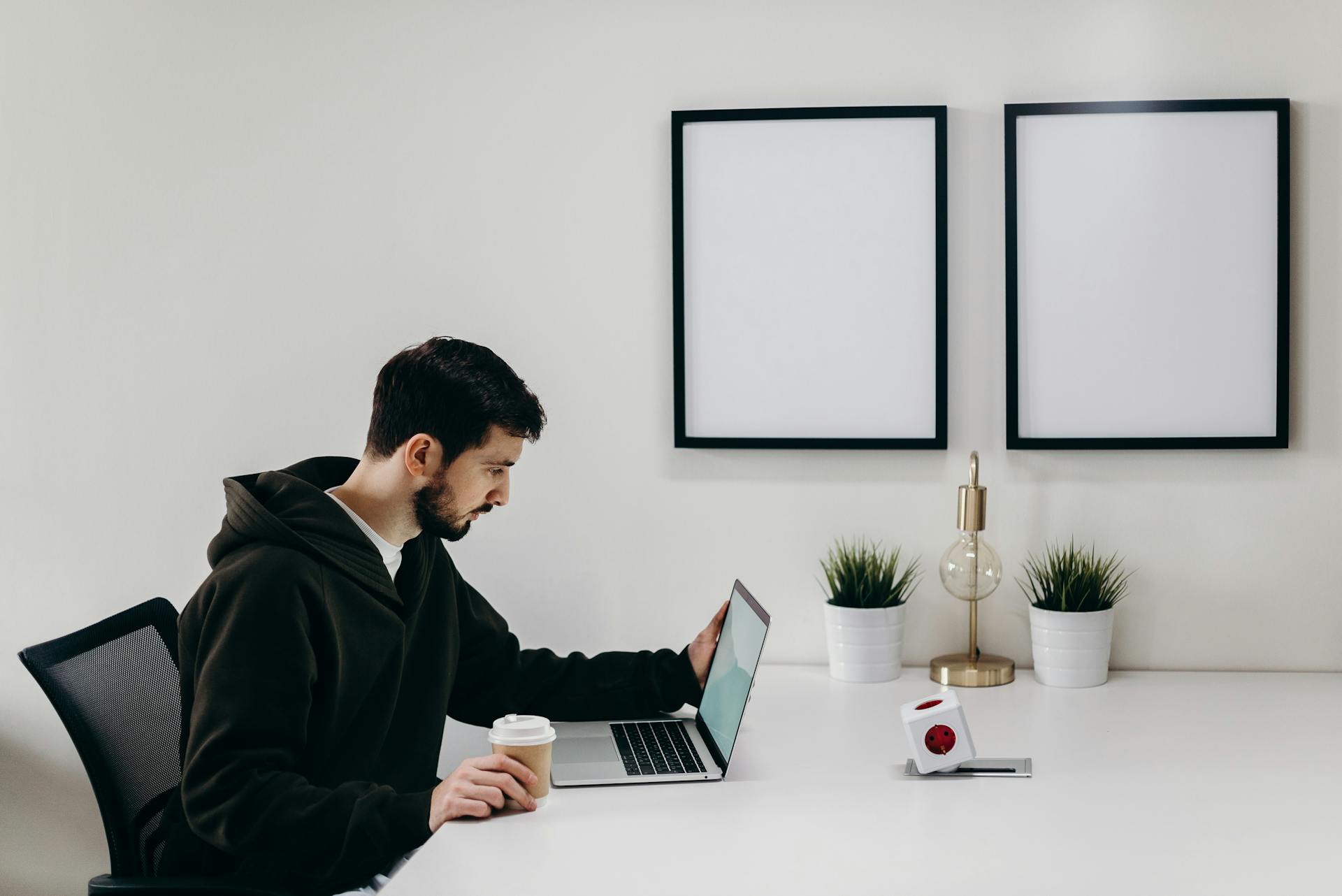 A man staring at a laptop screen | Source: Pexels