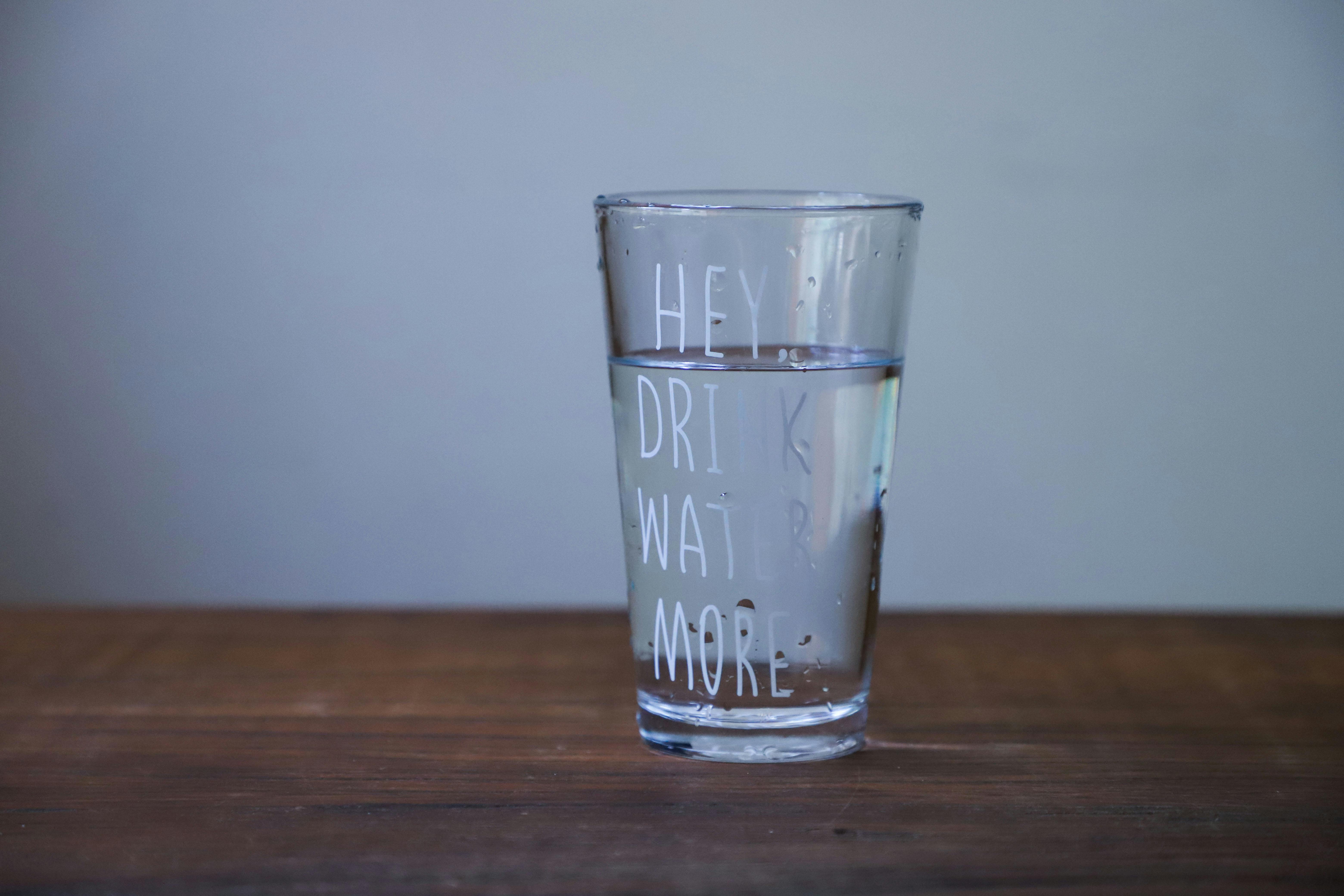 A glass of water on a table | Source: Pexels