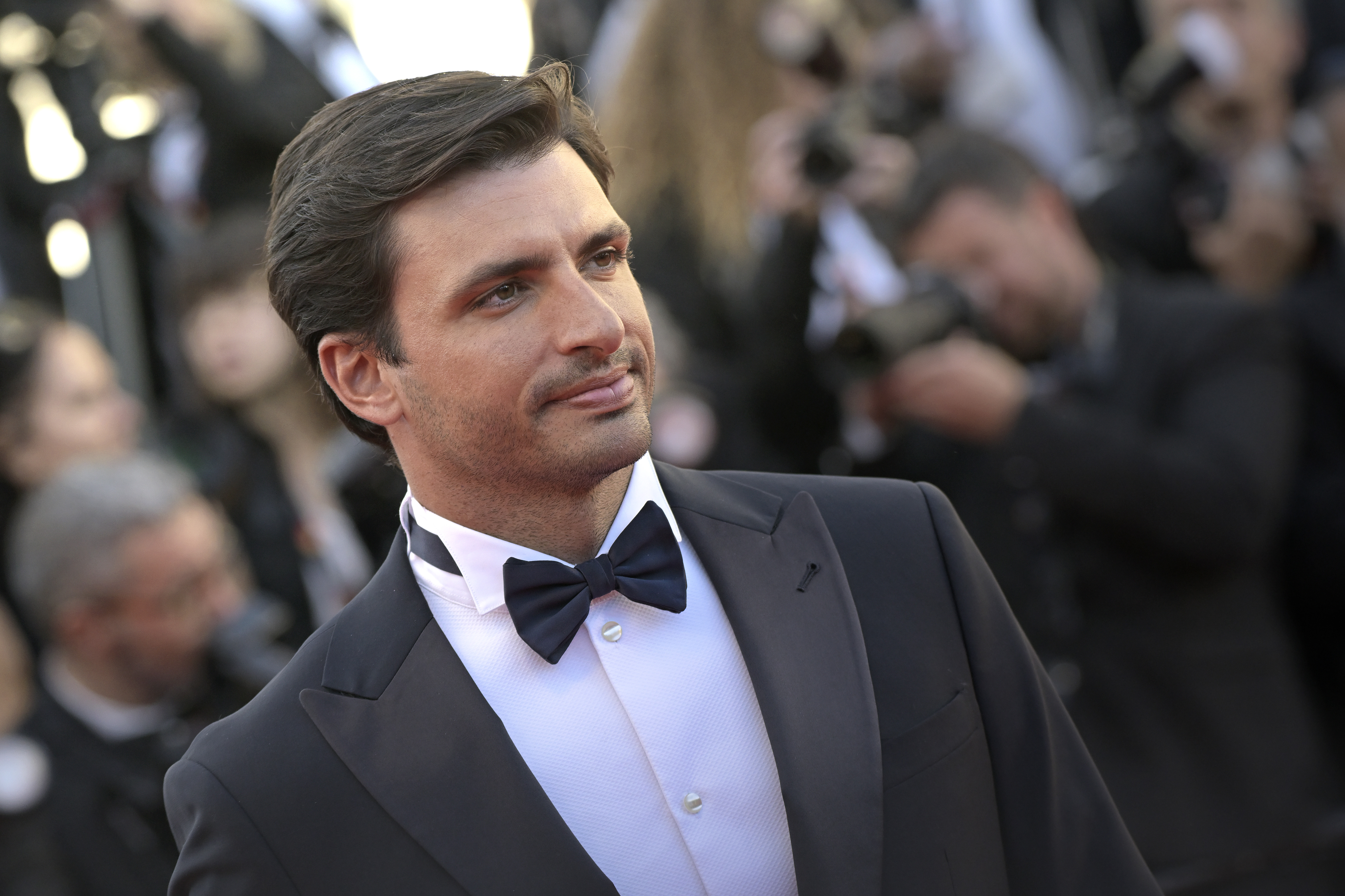 Spanish race car driver Carlos Sainz Jr. at the Cannes Film Festival 2026 Opening Ceremony and Red Carpet for “La Vénus Electrique (The Electric Venus)” on May 12, 2026 in Cannes, France. | Source: Getty Images