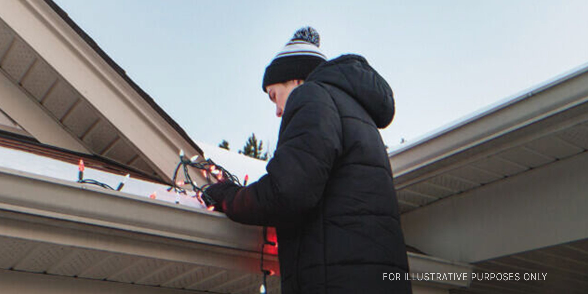 Boy decorating a house | Source: Shutterstock