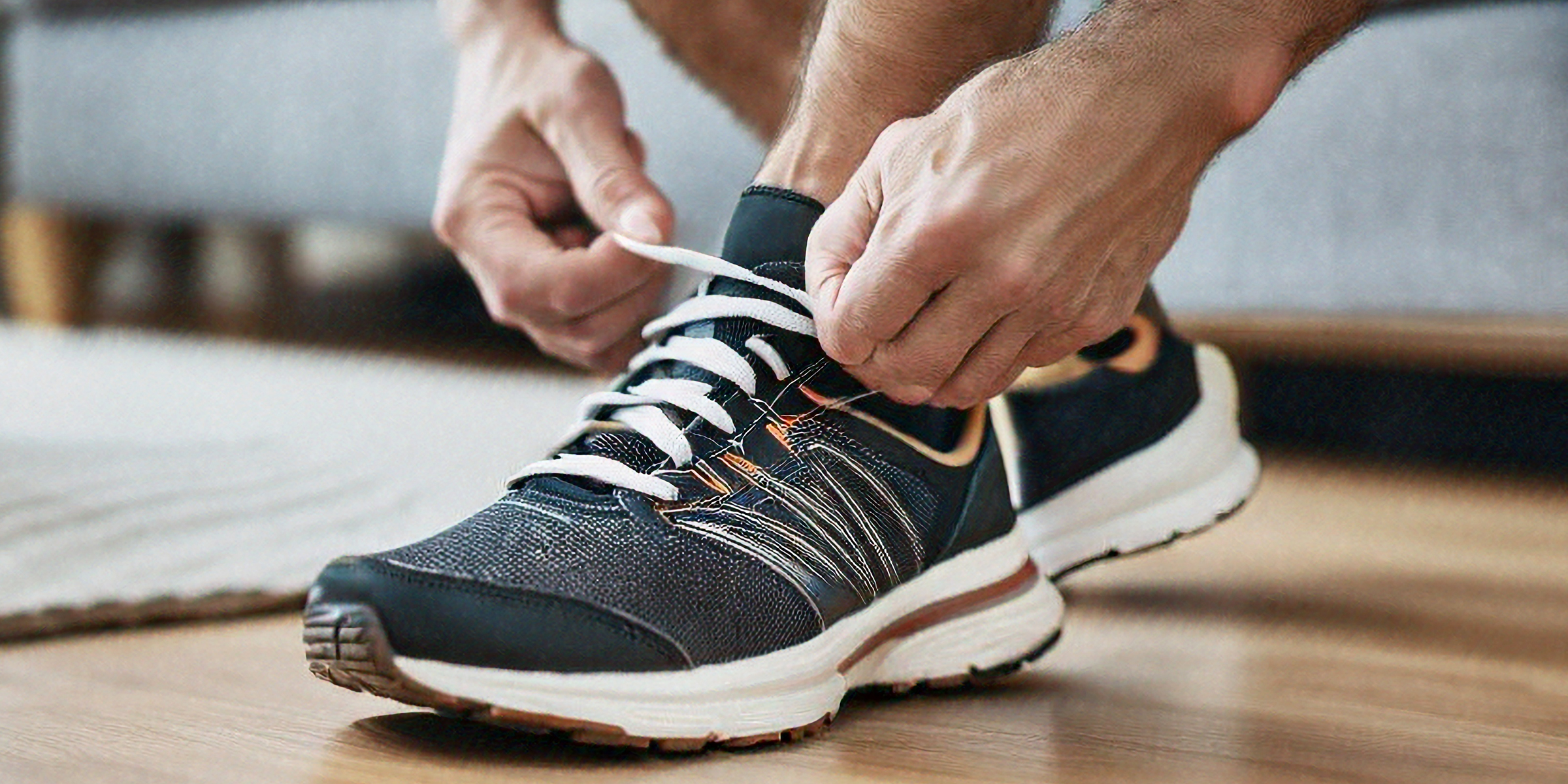 A man fastening his shoelace | Source: Shutterstock