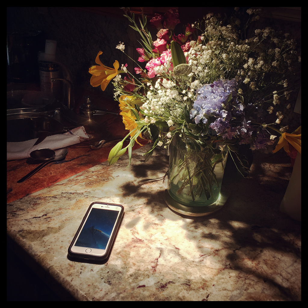 A cellphone on a kitchen counter | Source: Midjourney