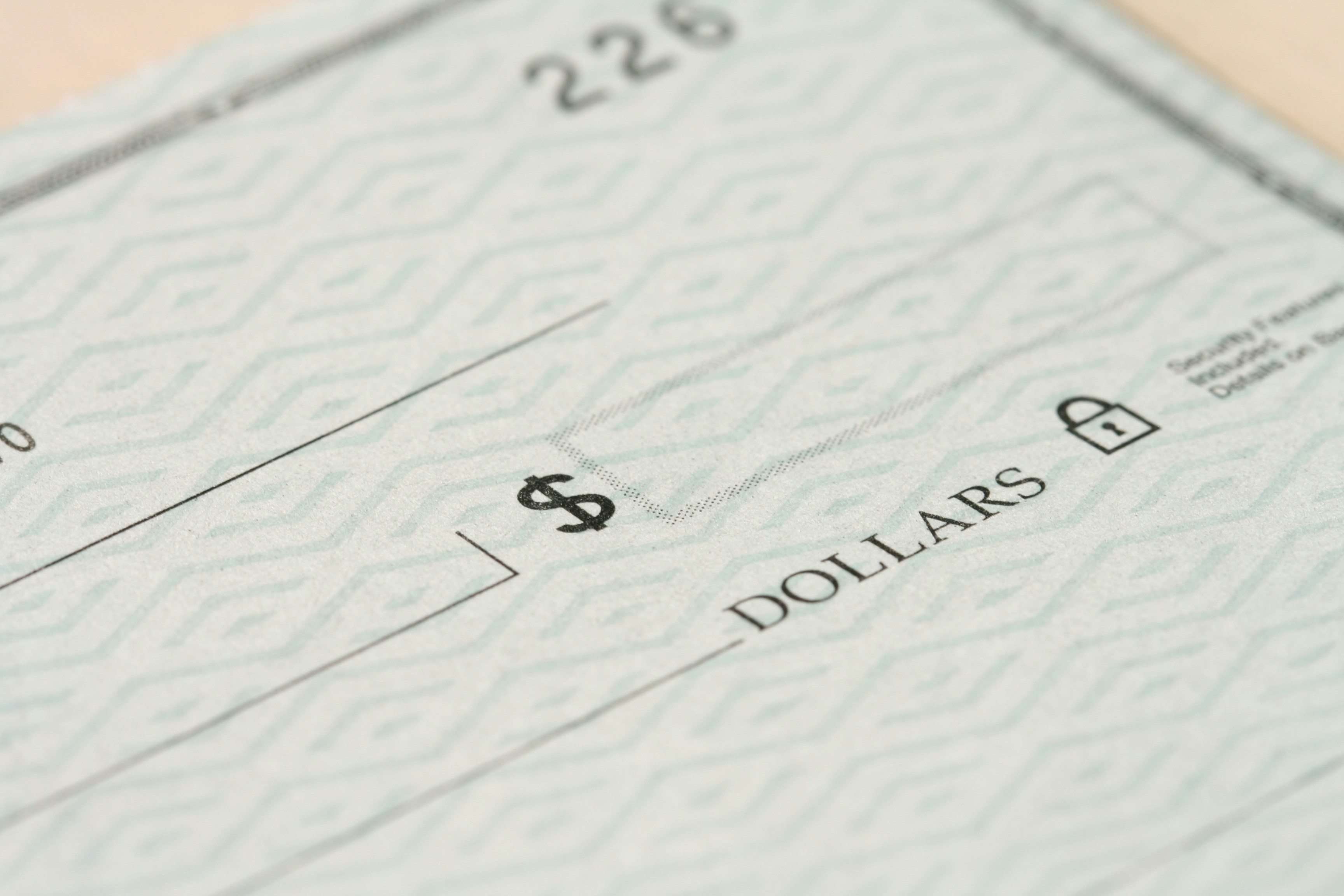 A close-up of a blank cheque | Source: Unsplash