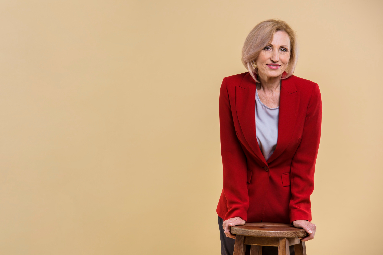 A smiling senior woman | Source: Freepik