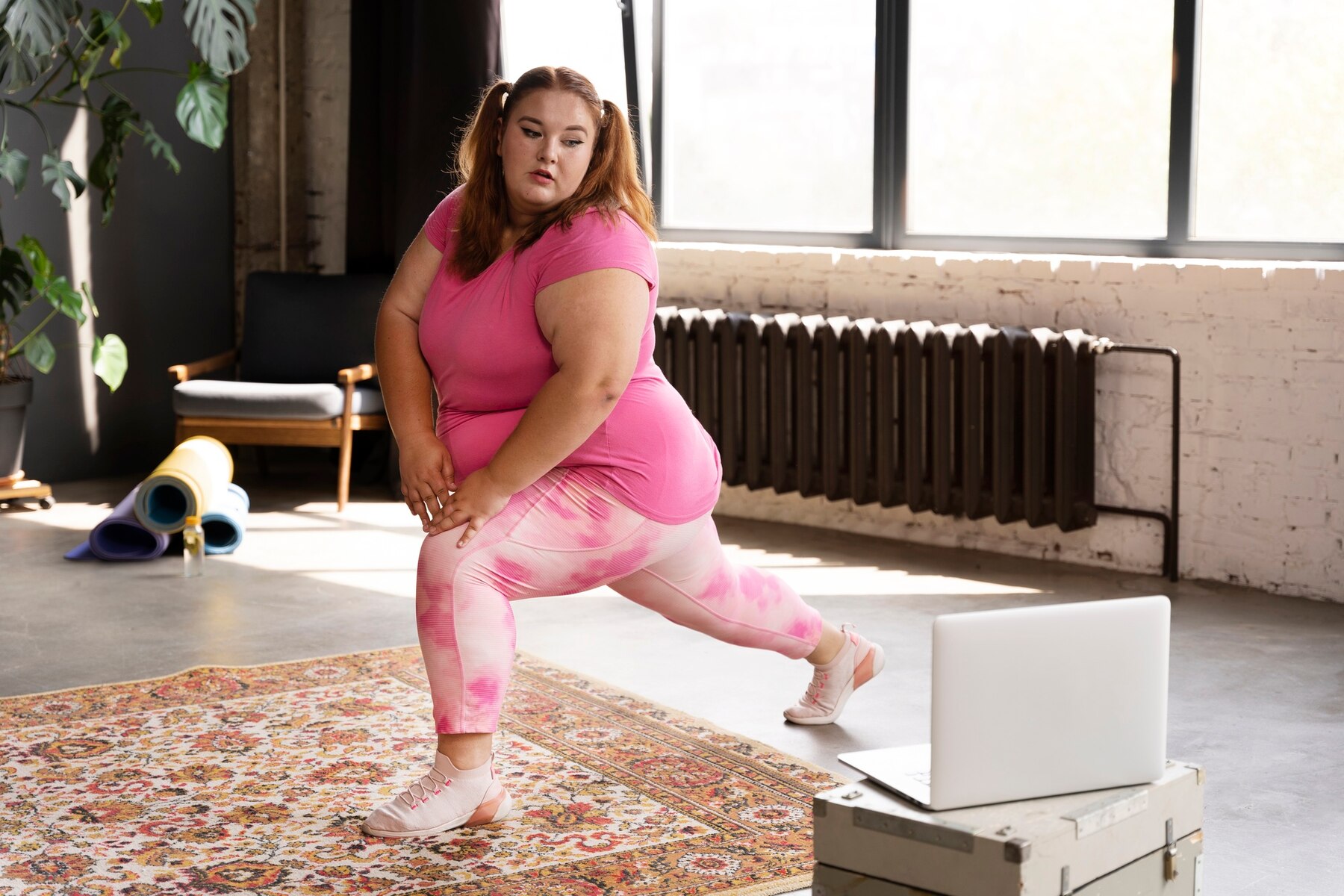 A woman in a yoga class | Source: Freepik