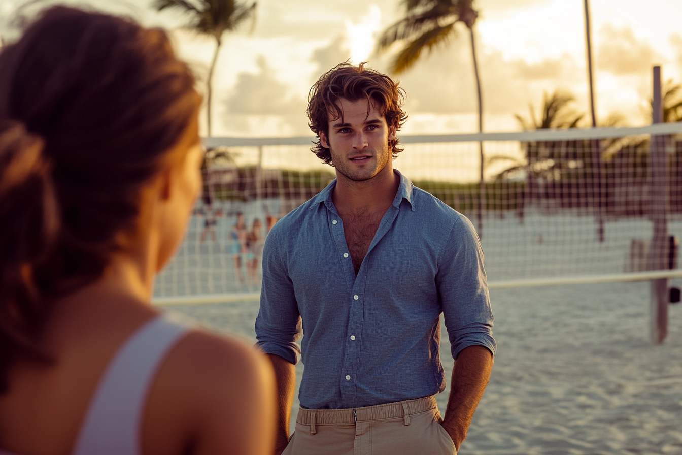 Man in his 30s talking to a woman near a volleyball court at a sandy beach | Source: Midjourney