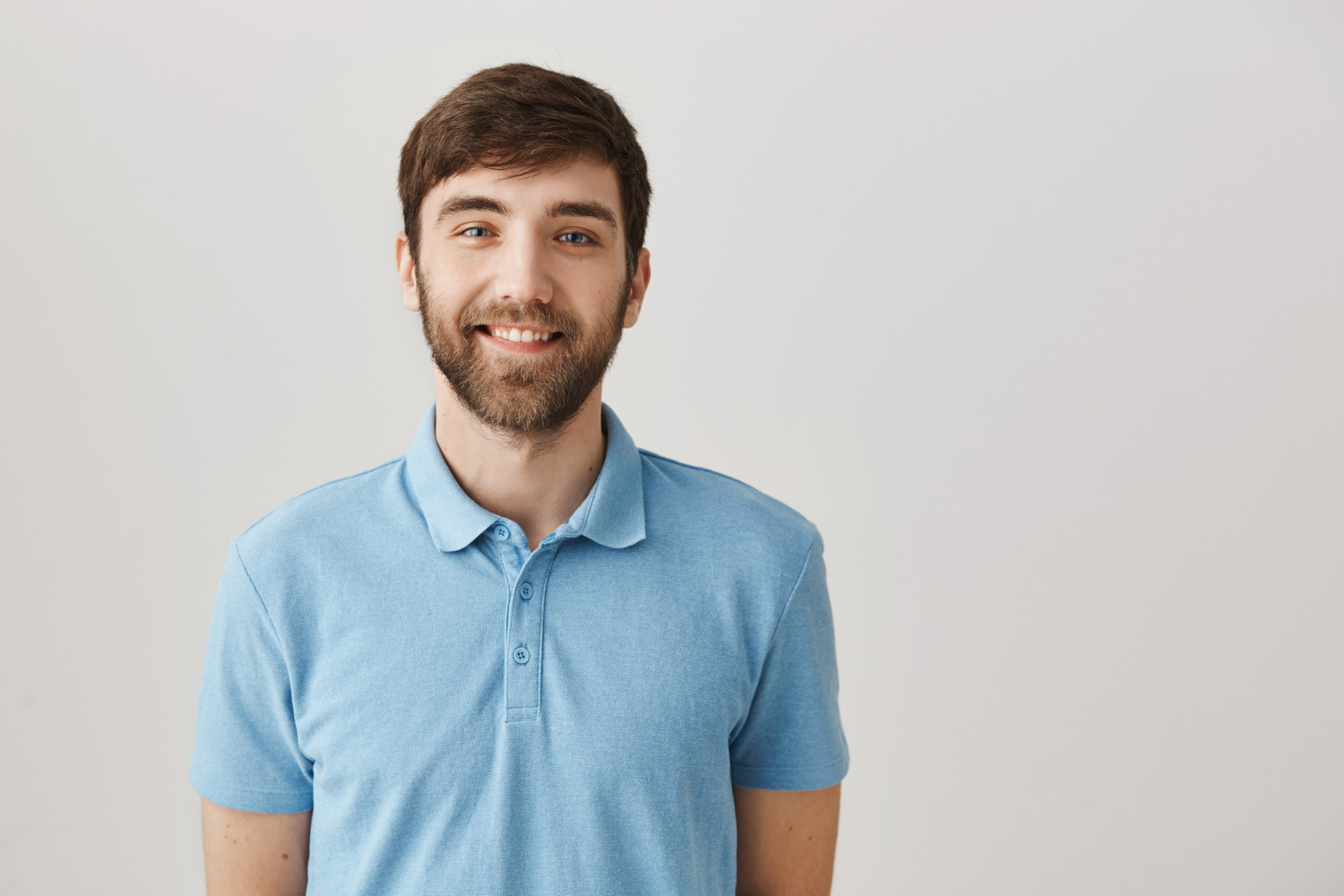 A man smiling | Source: Freepik