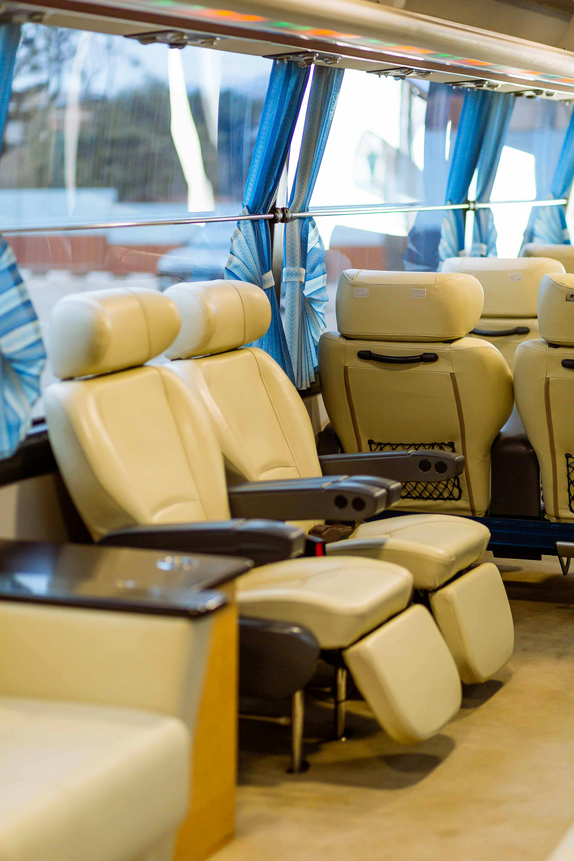 Seating inside a luxury tour bus | Source: Pexels